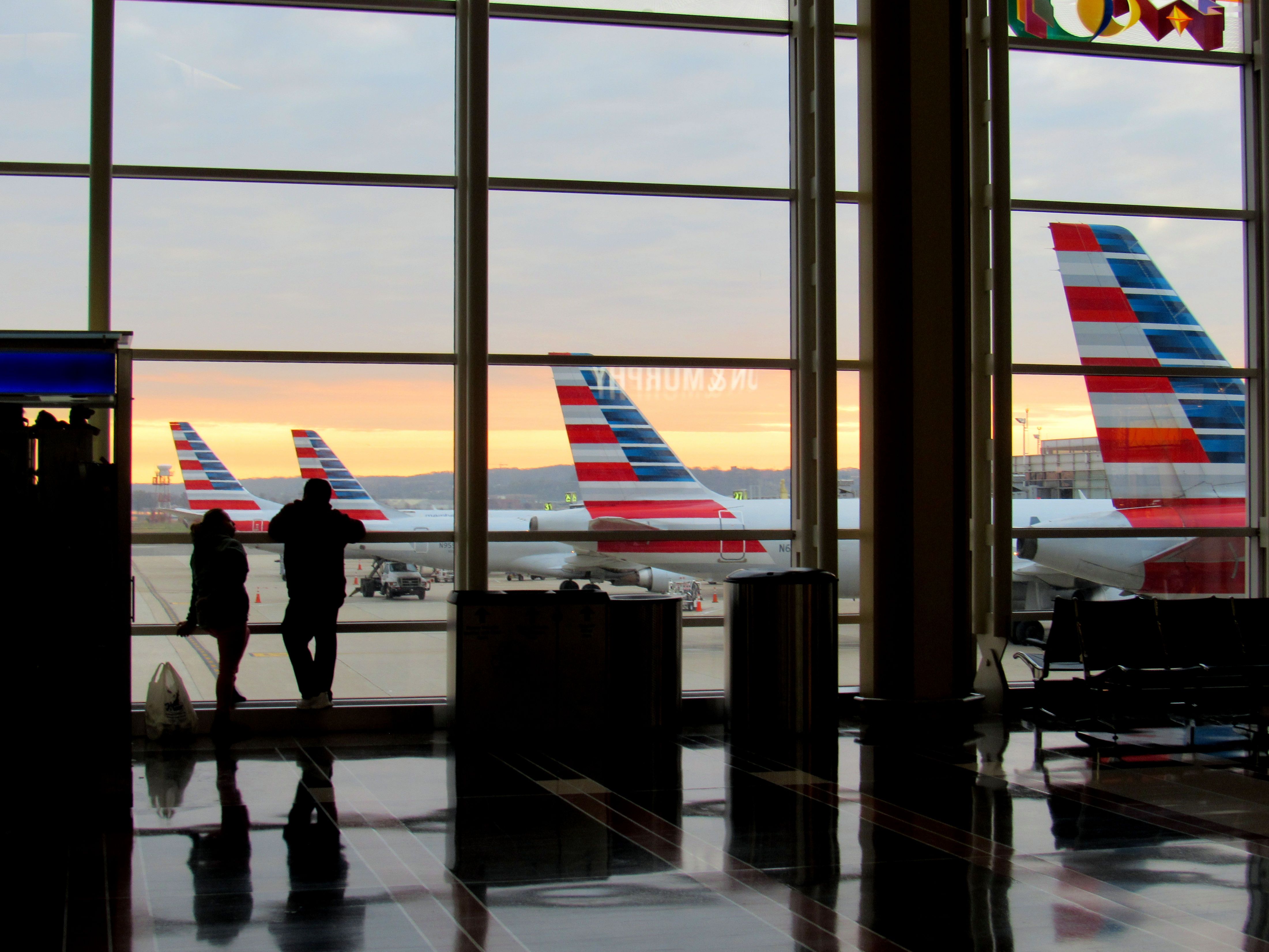 Several American Airlines aircraft parked at Ronald Reagan Washington National Airport (DCA).