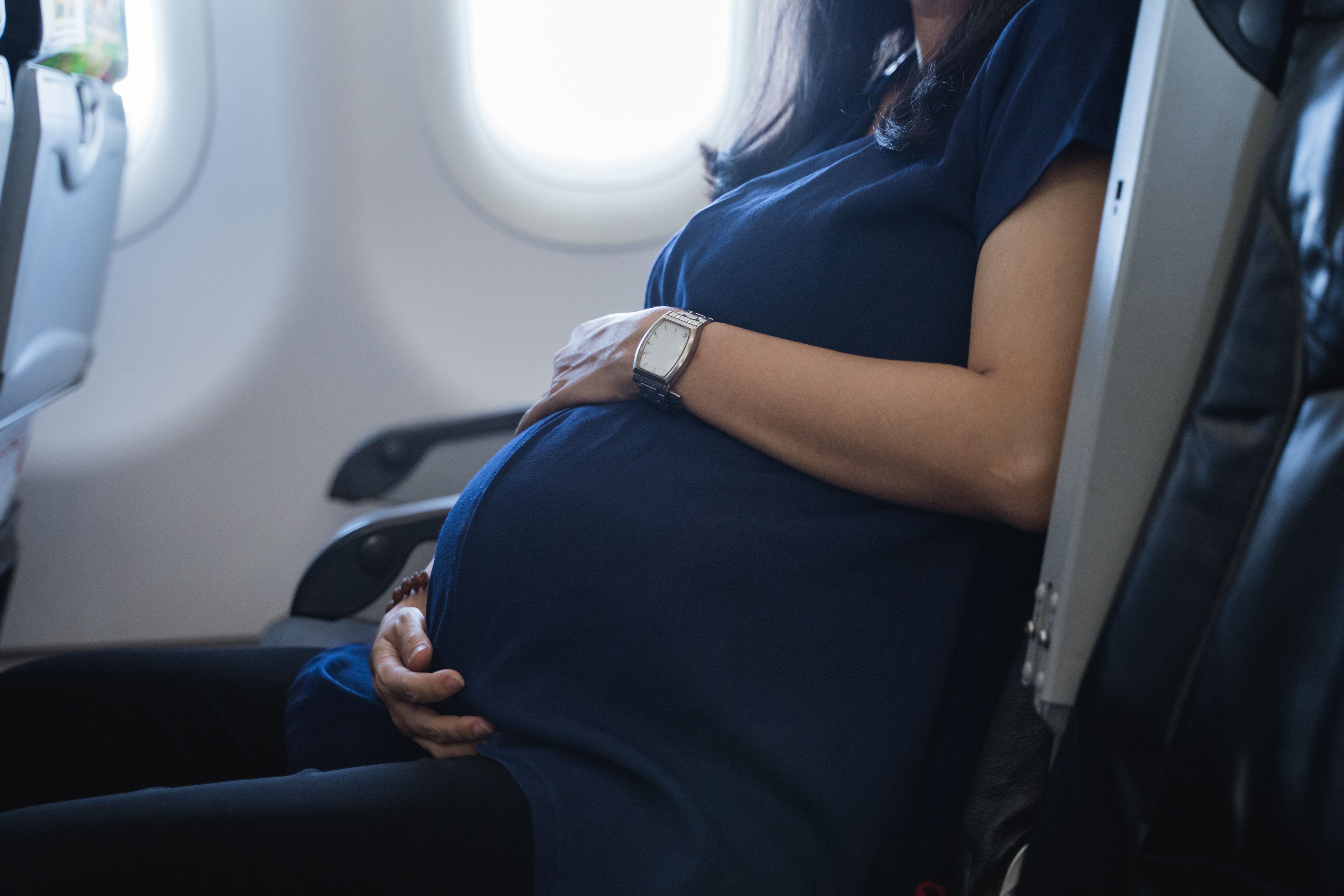 Pregnant woman on an airplane