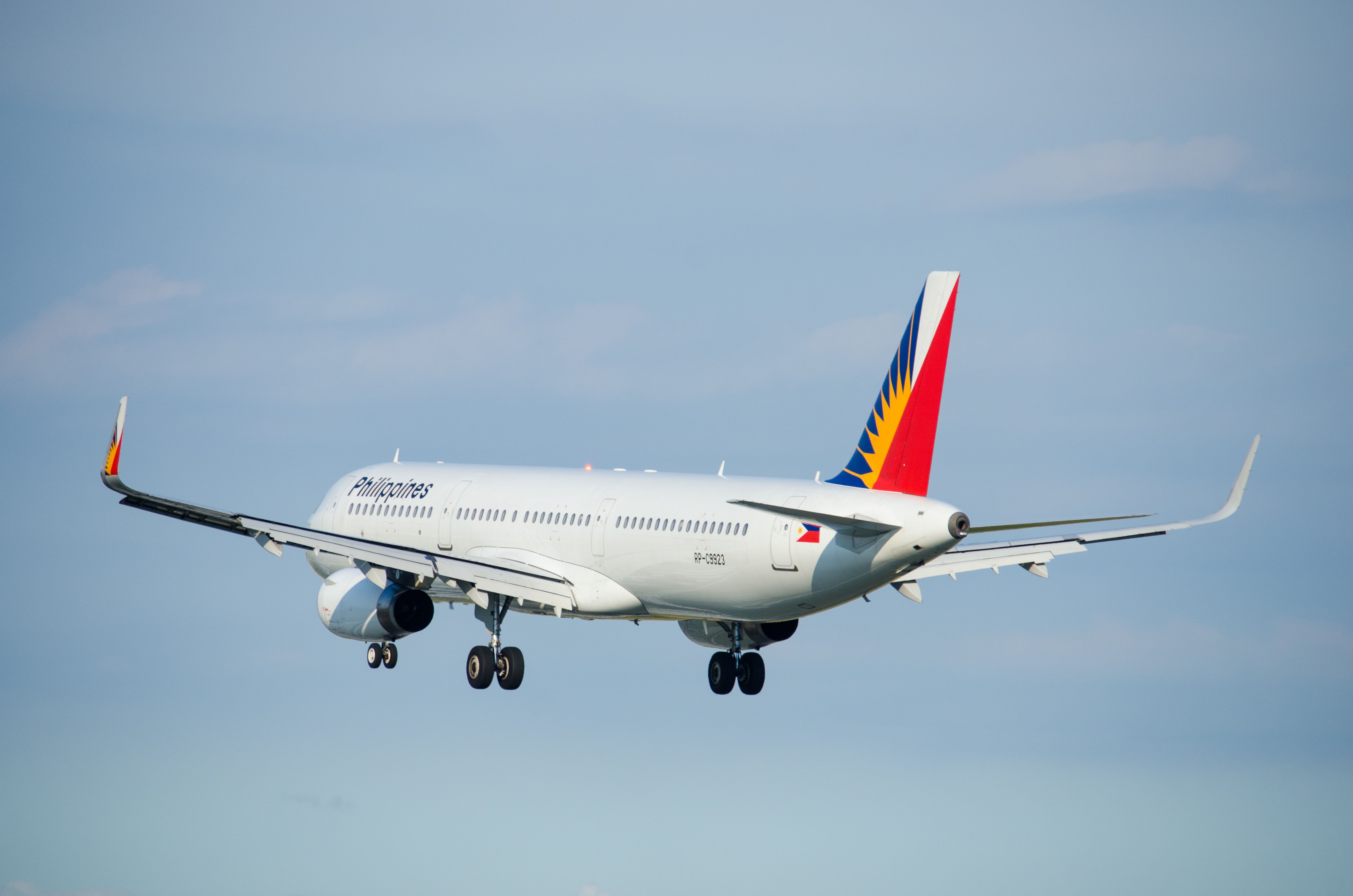 Philippine Airlines A320 landing at Ninoy Aquino International Airport, Manila
