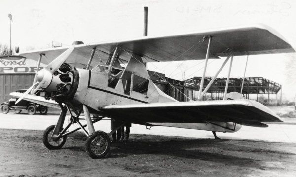 Vintage photo of a small single-engine aircraft