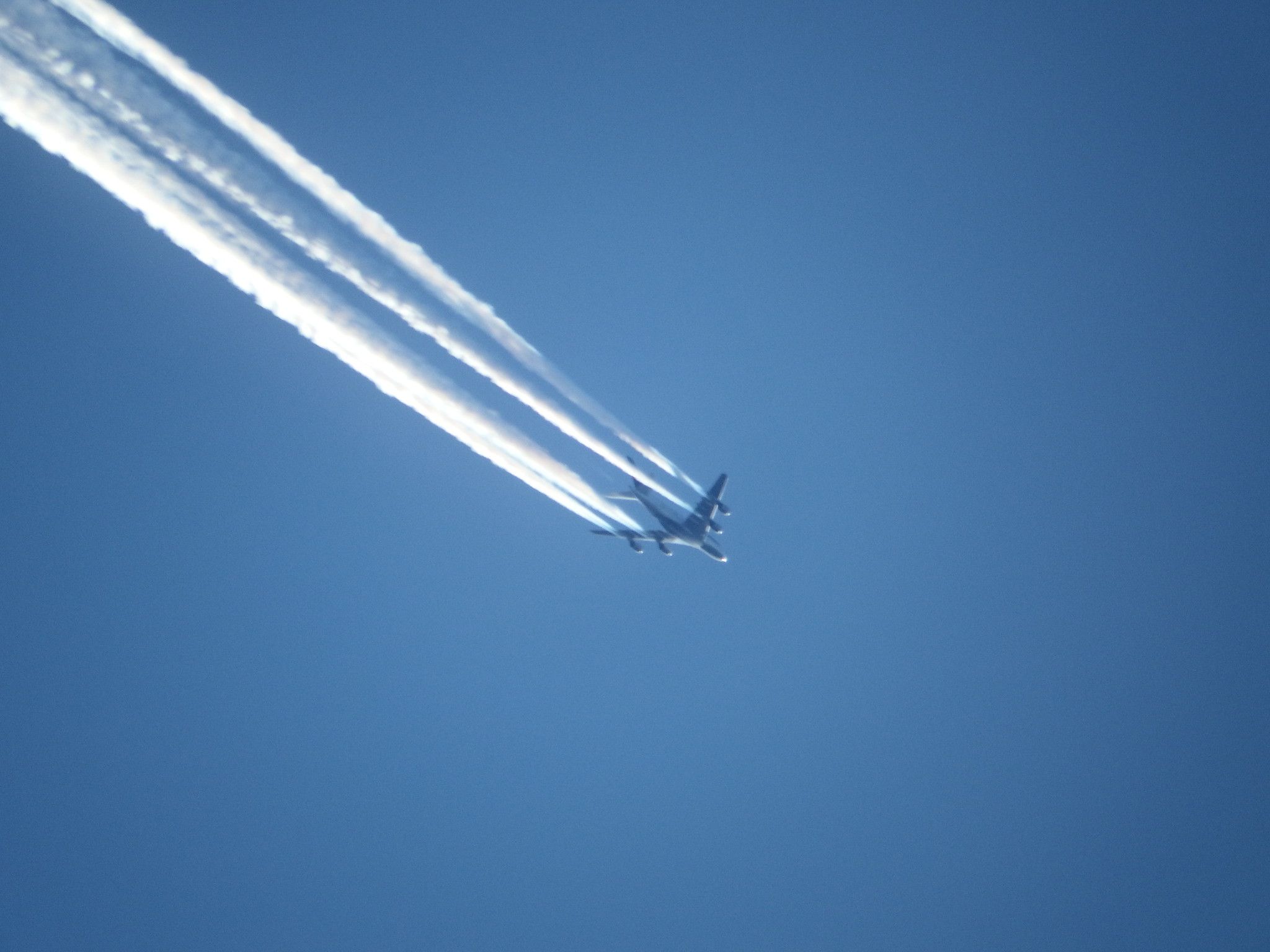 Planes and contrails - A380 making contrails in the blue yonder