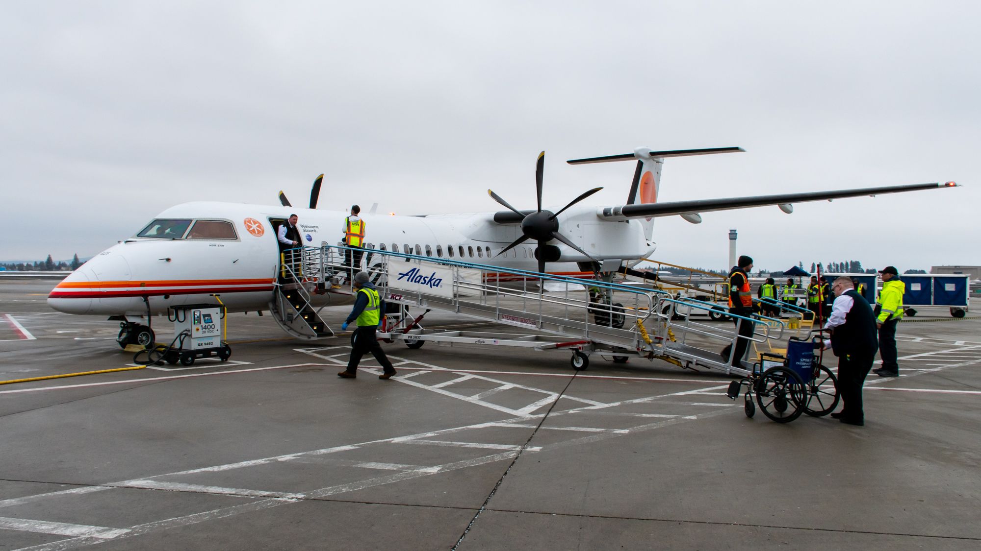 Wheelchair and Ramp Meeting Disabled Passenger on Meatball Q400