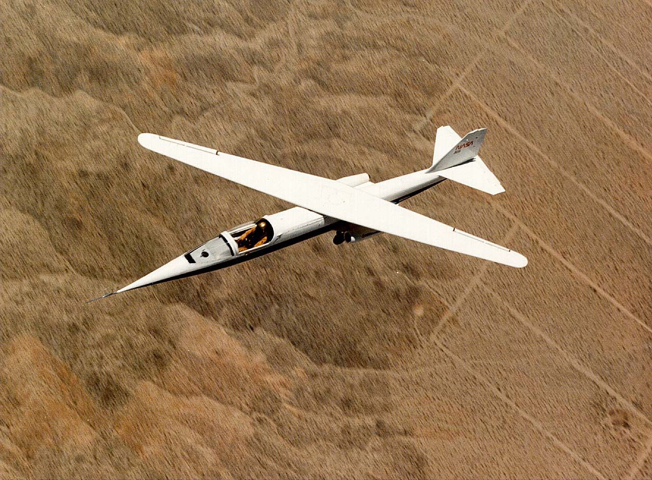 The NASA AD-1 aircraft in flight, with its oblique wing turned to 60 degrees.