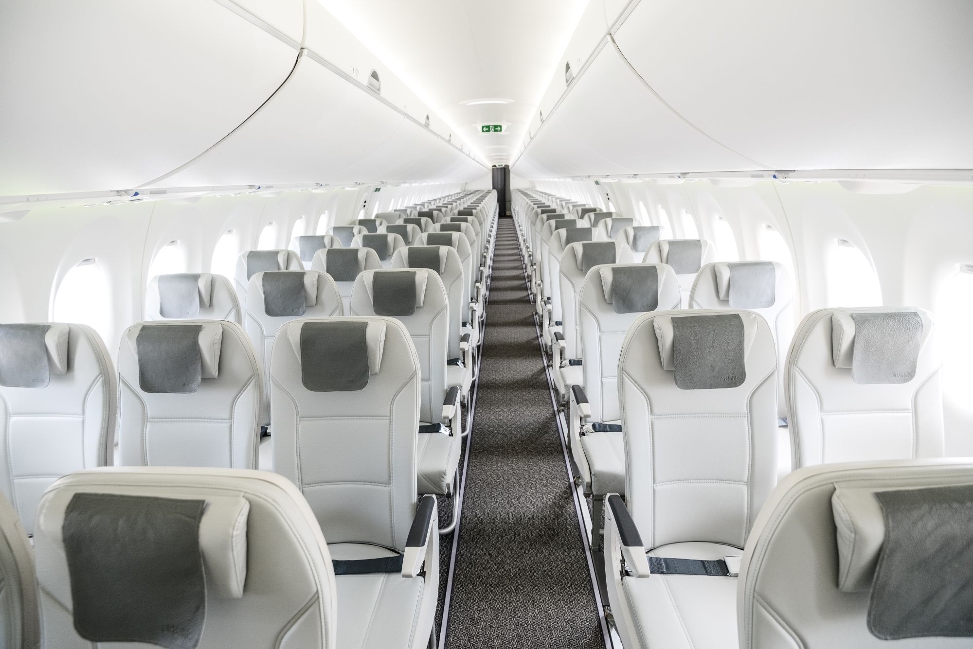 The entire cabin of an airBaltic Airbus A220.