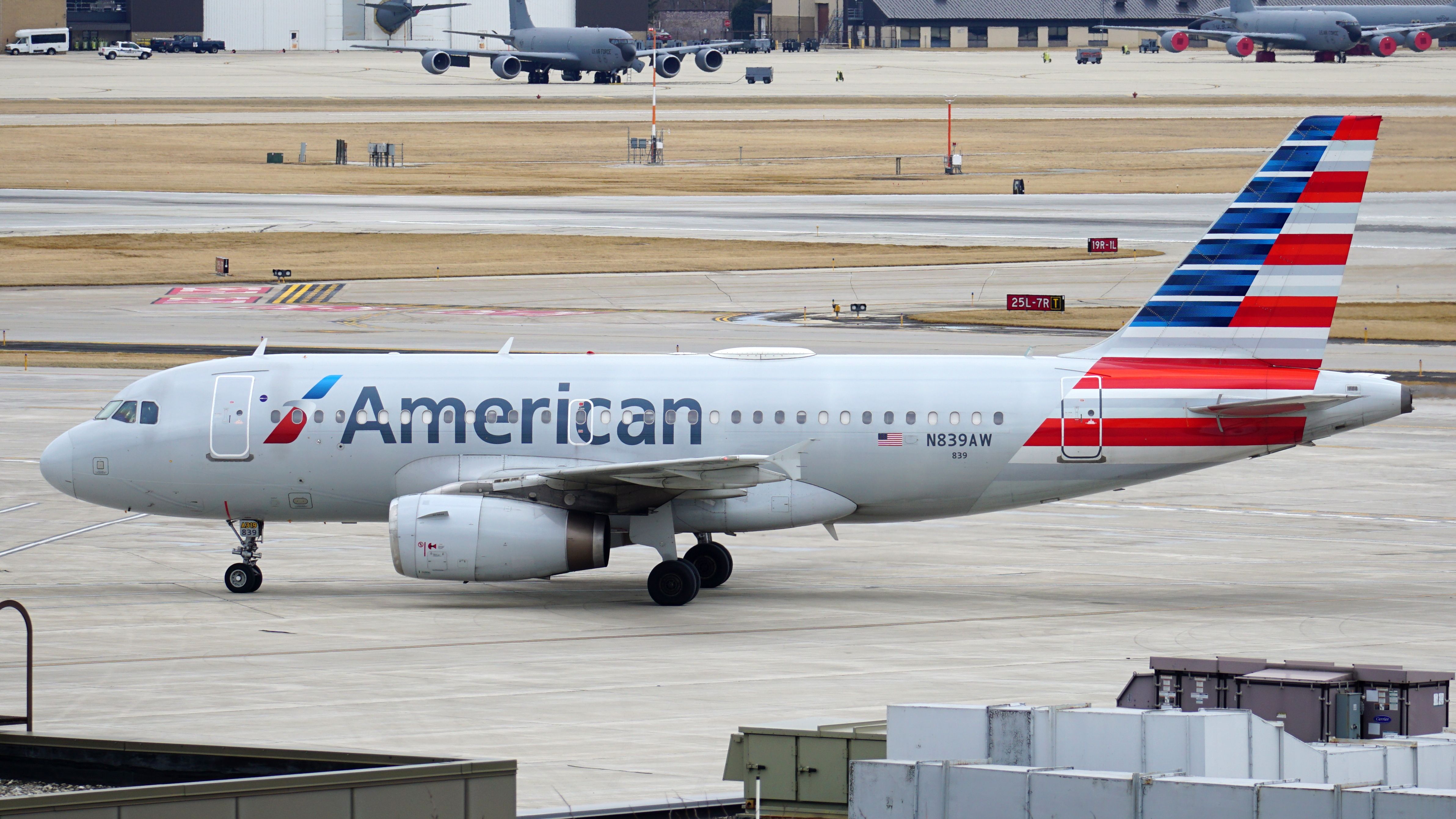 American Airlines Airbus A319 taxies on the runway after landing at Milwaukee General Mitchell International Airport. On The Run Photo Shutterstock