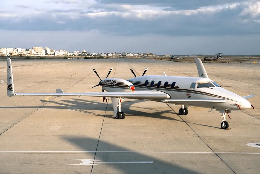 A Beechcraft Starship parked at an airport.