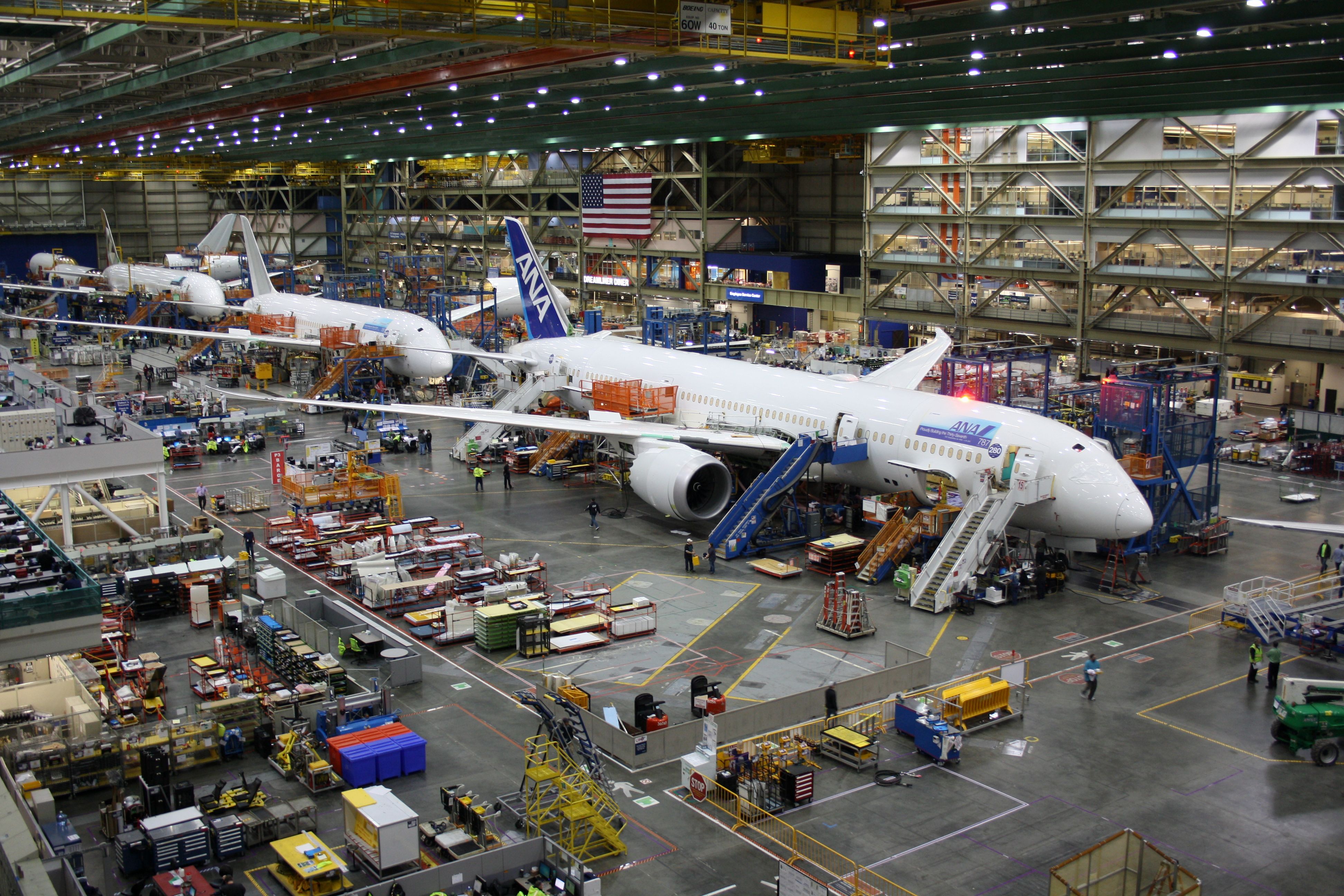 Boeing employees building a Boeing 787 jet at its Everett factory.