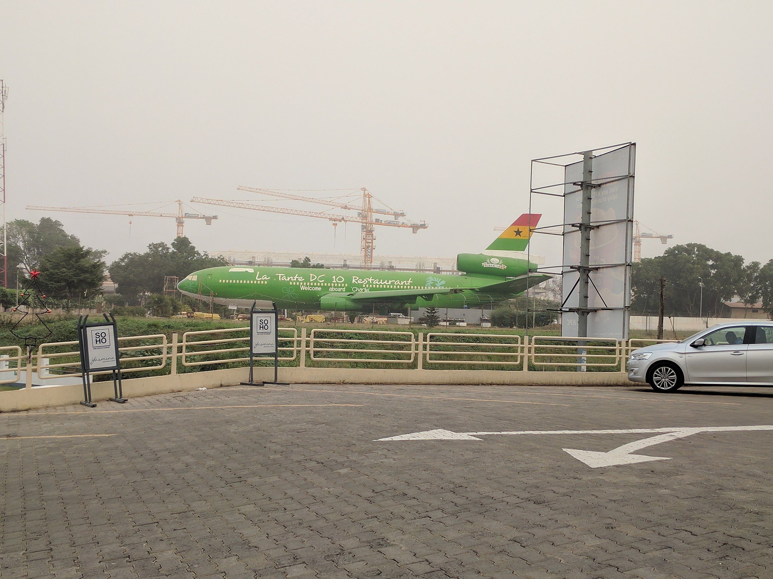 A view of the Ghana DC-10 Restaurant from a nearby street.