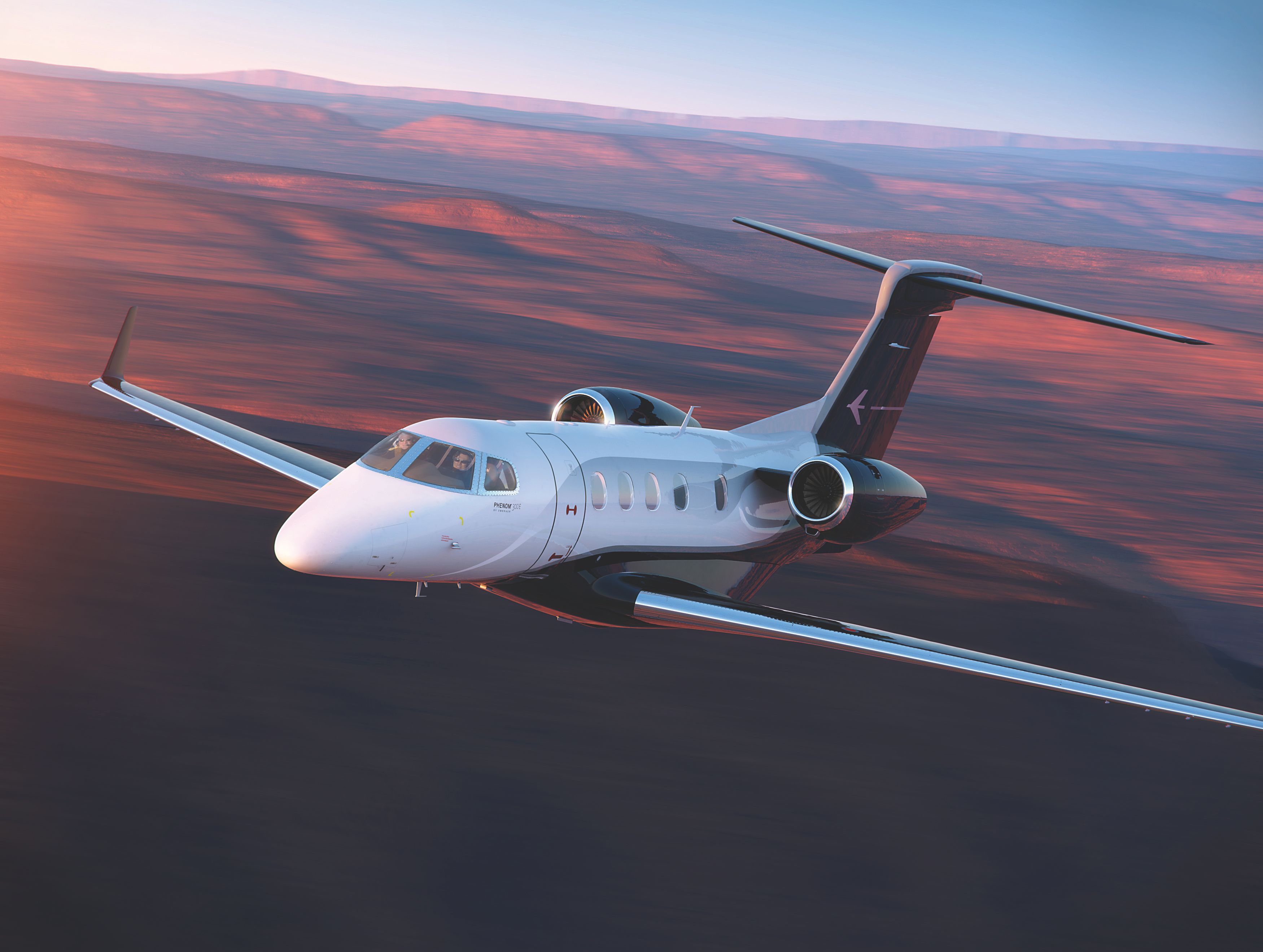 Phenom-300E_Exterior-Flight-Sunset  - Embraer