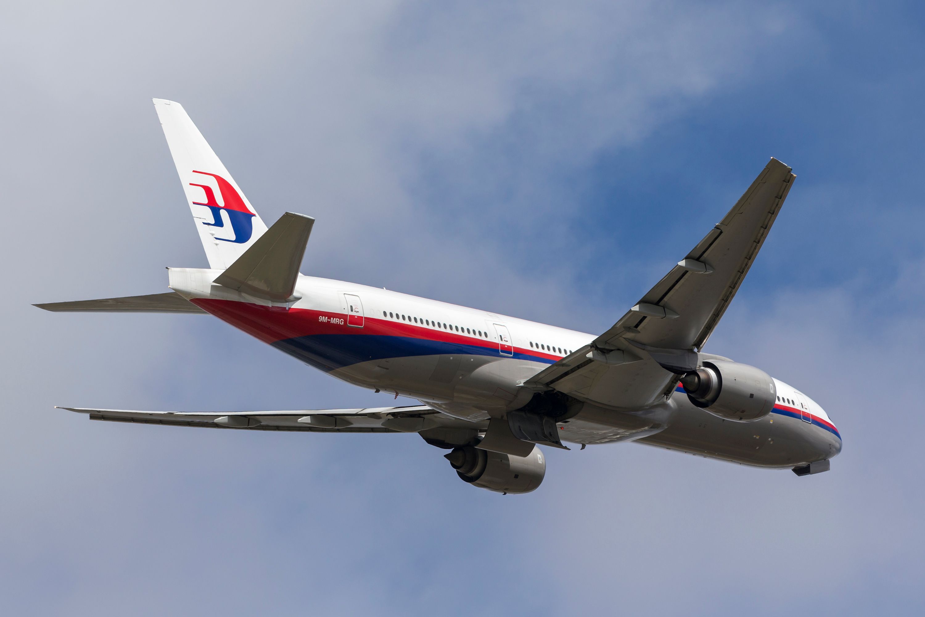 Malaysia Airlines Boeing 777 (9M-MRG) departing Melbourne International Airport.