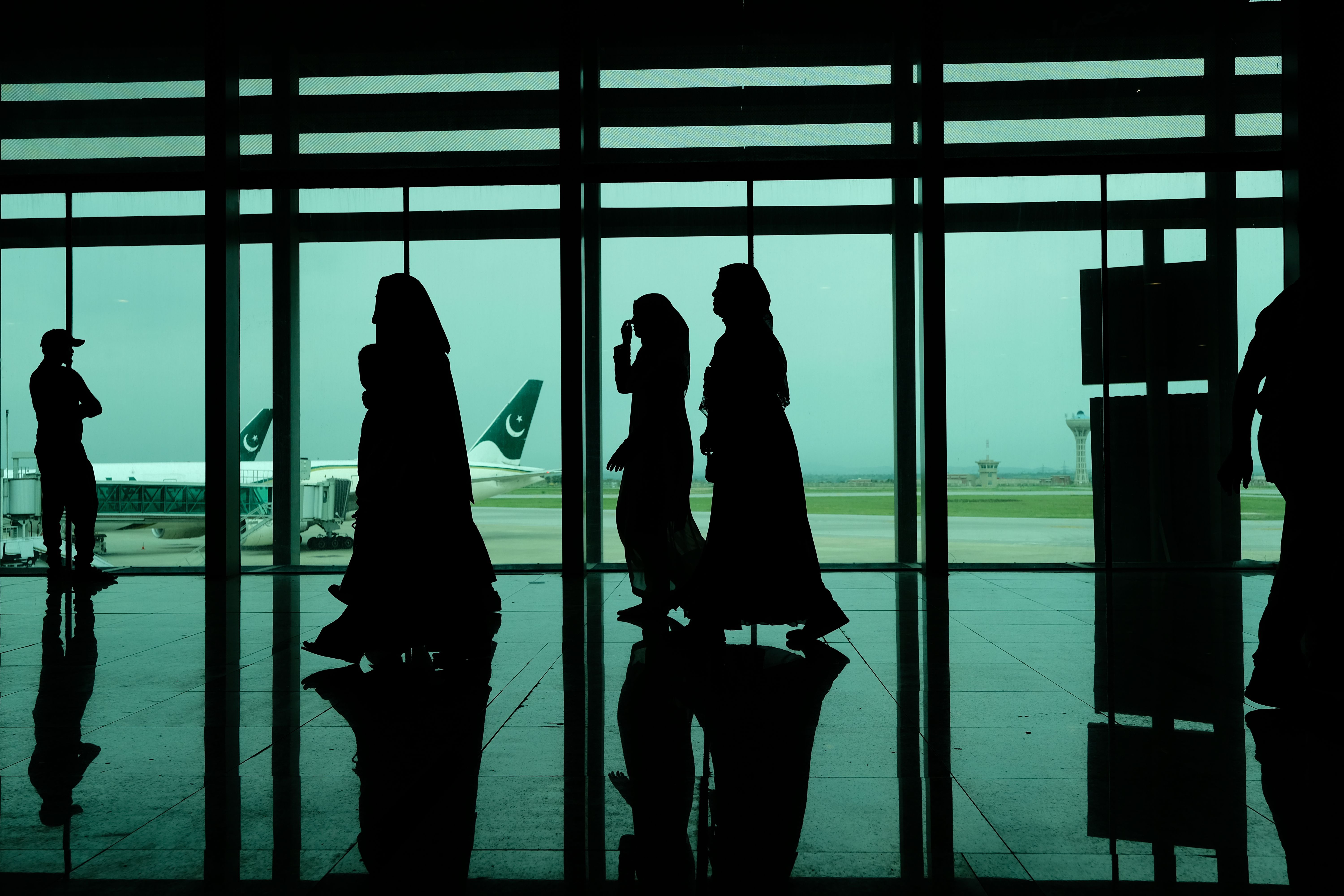 Travelers walking in the New Airport of Capital City Islamabad.