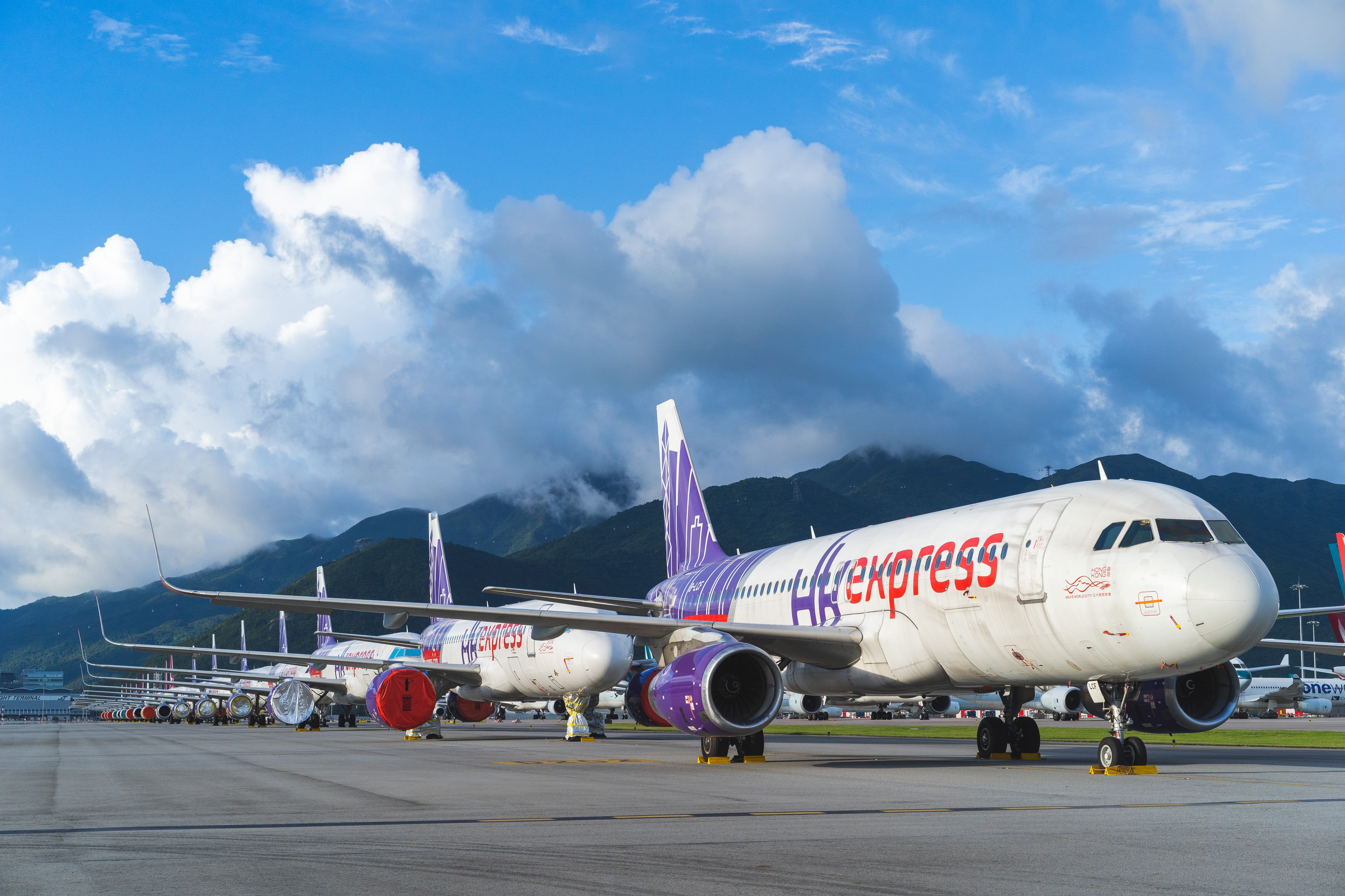 HK Express Airbus aircraft lines up in Hong Kong.