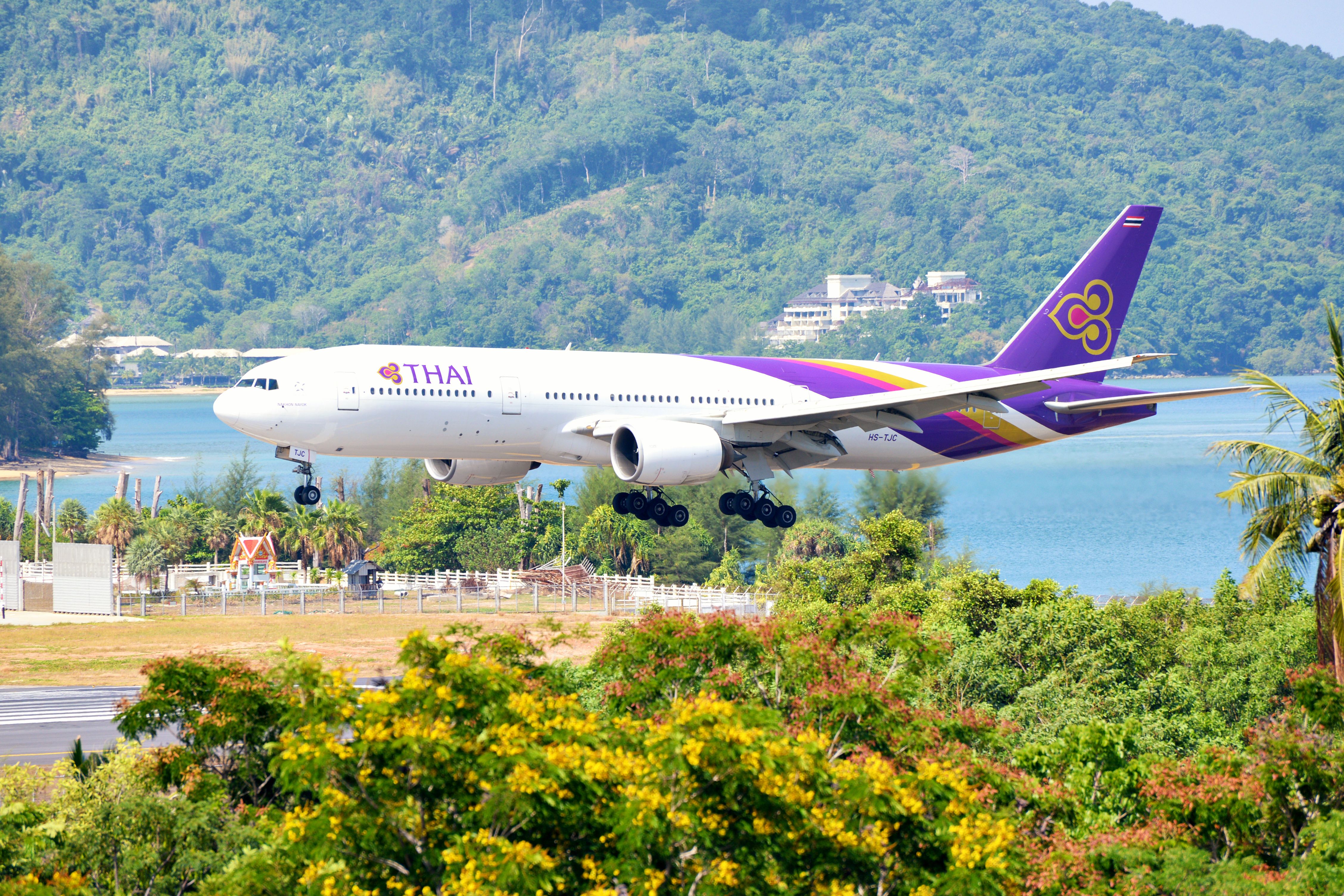 A Thai Airways Boeing 77 landing in Phuket