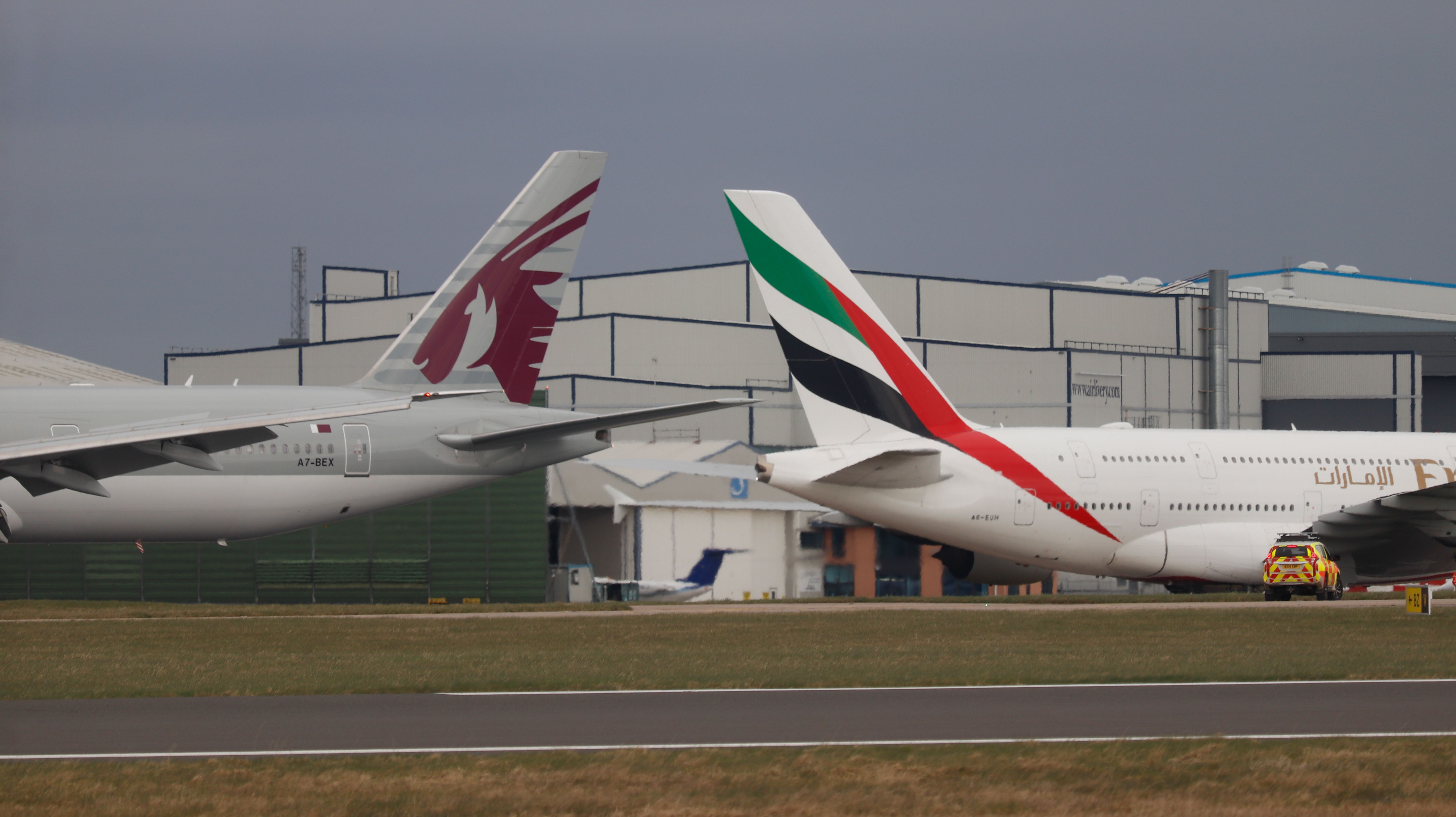 Emirates Airbus A380 (A6-EUH) and Qatar Airways Boeing 777 (A7-BEX)