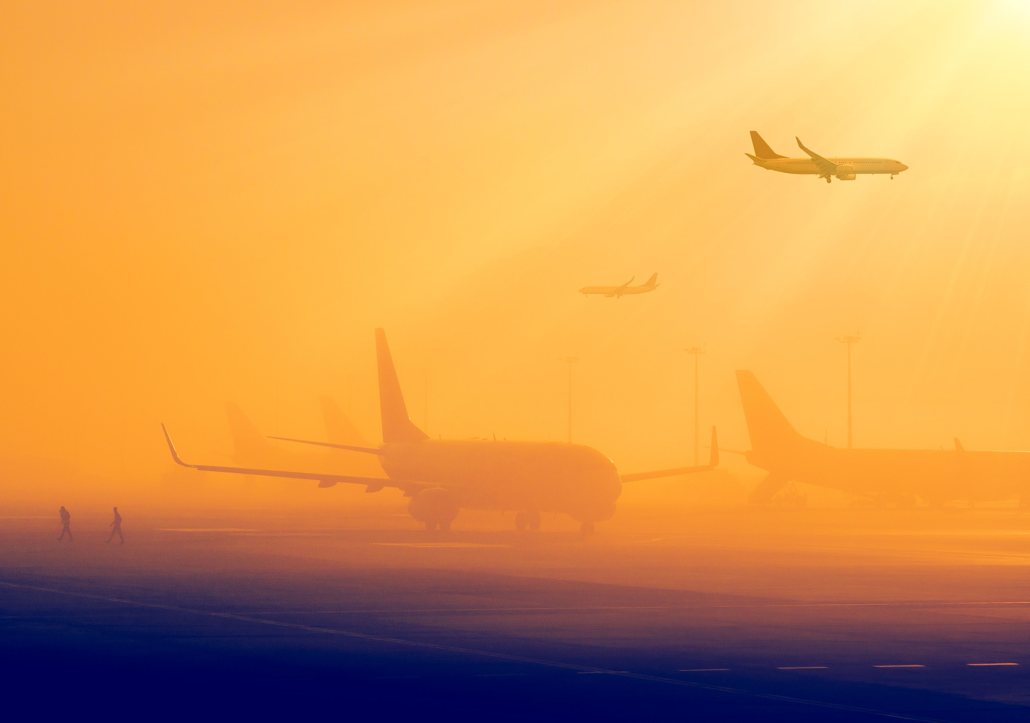 airplanes in foggy conditions