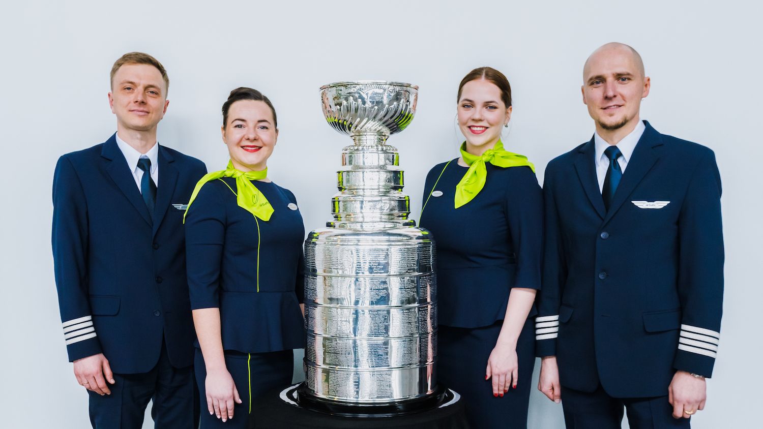 airBaltic crew with the Stanley Cup for Hockey Day