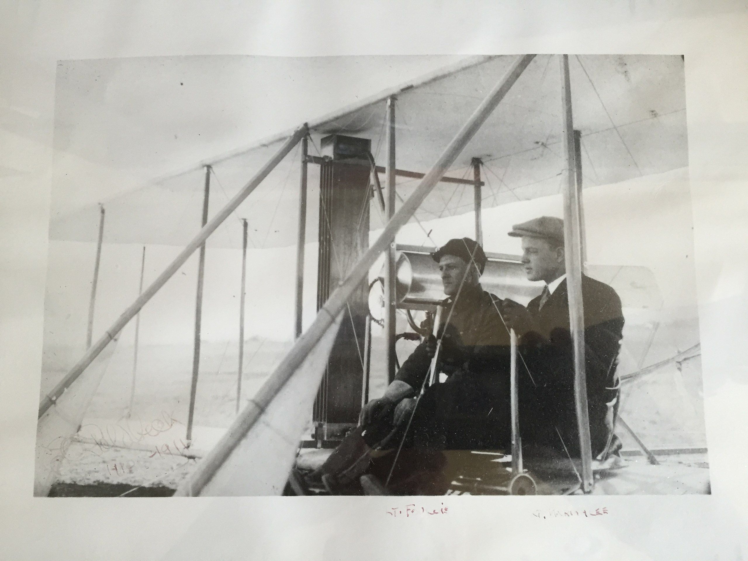 Benjamin Foulois and Philip Parmelee flying an early Wright model aircraft. 