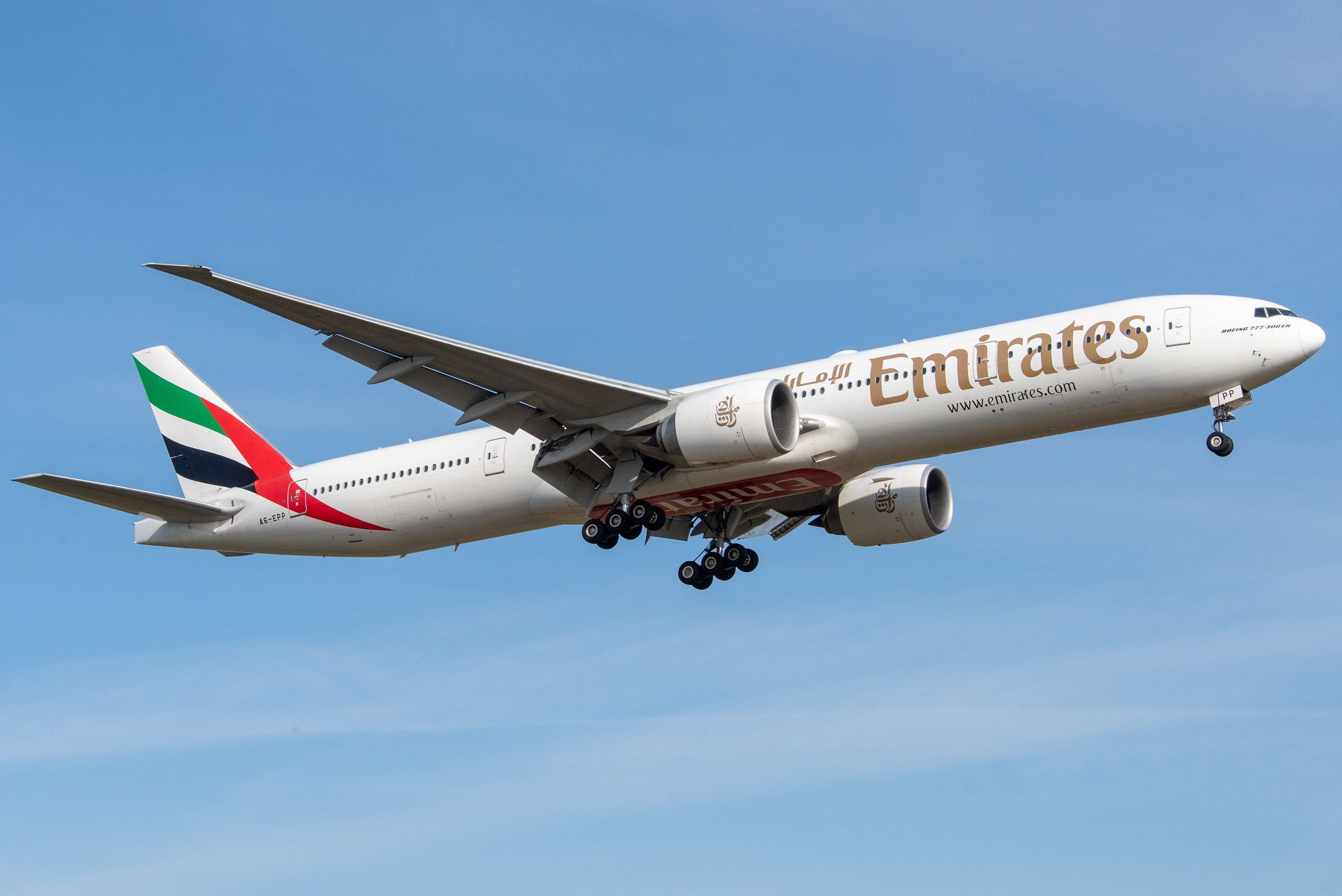 An Emirates Boeing 777-300ER in flight.
