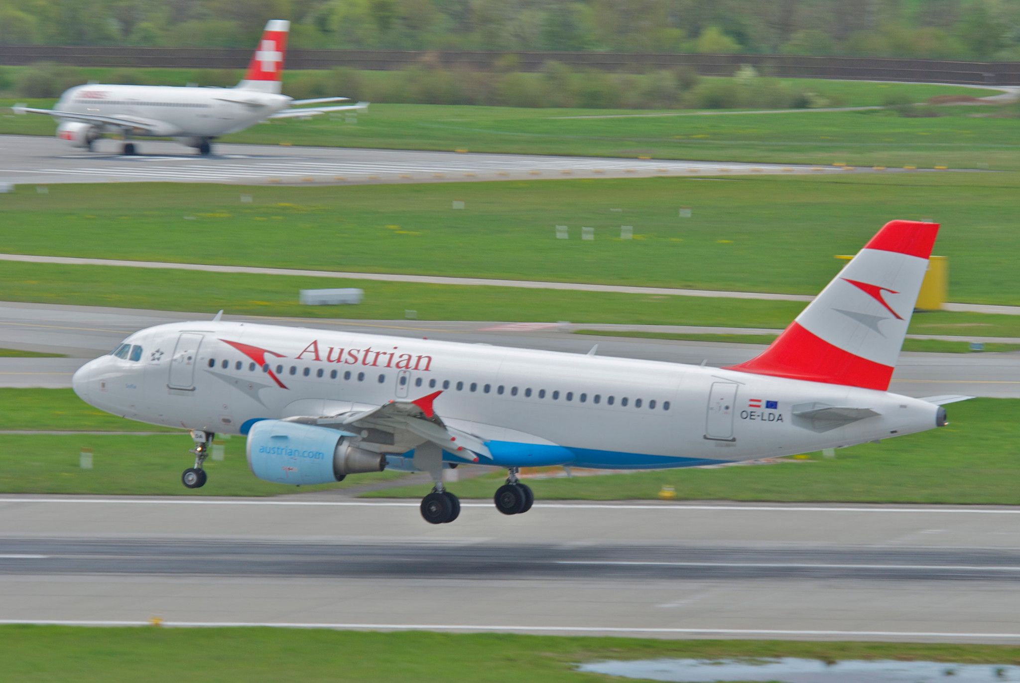 An Austrian Airlines aircraft taking off.