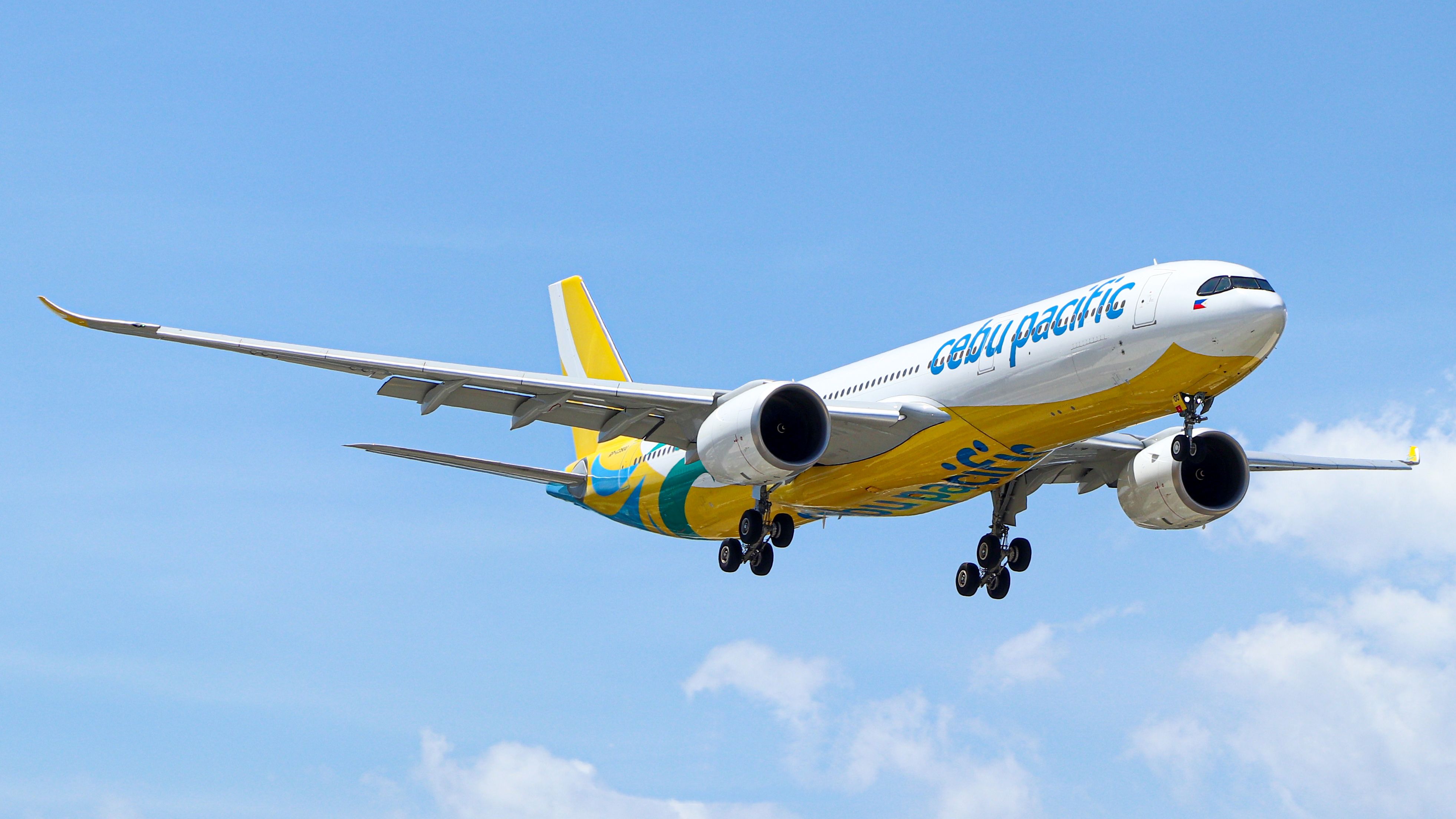 A Cebu Pacific Airbus A330neo flying in the sky.