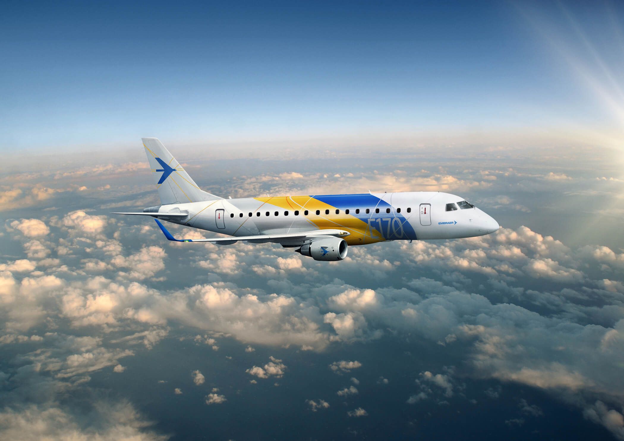 Embraer-E170 Flying Above Clouds Graphic