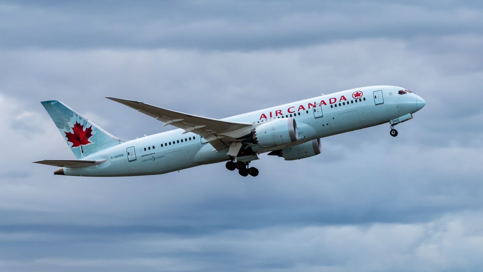 RISING AIR CANADA 787-8 AGAINST OVERCAST
