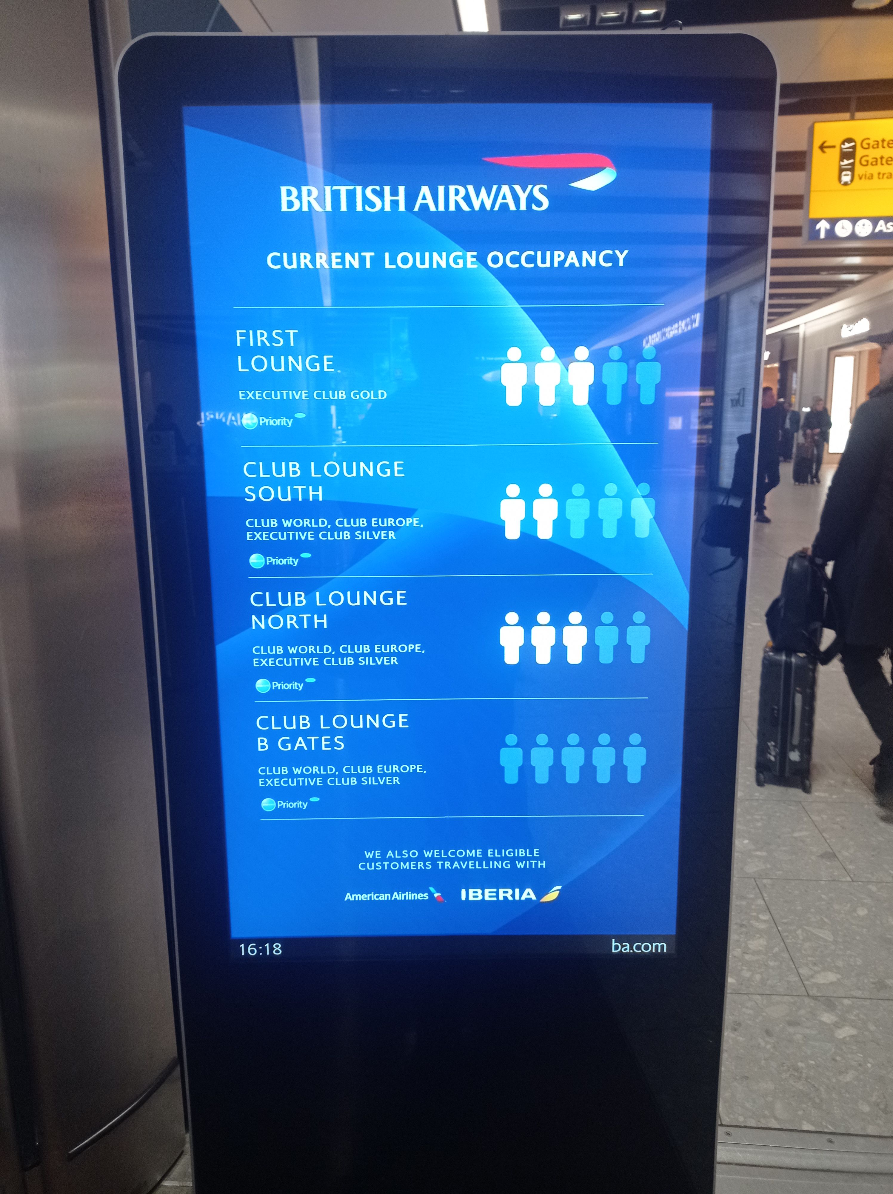 An electronic sign that tells you how busy the BA lounges are at London Heathrow.