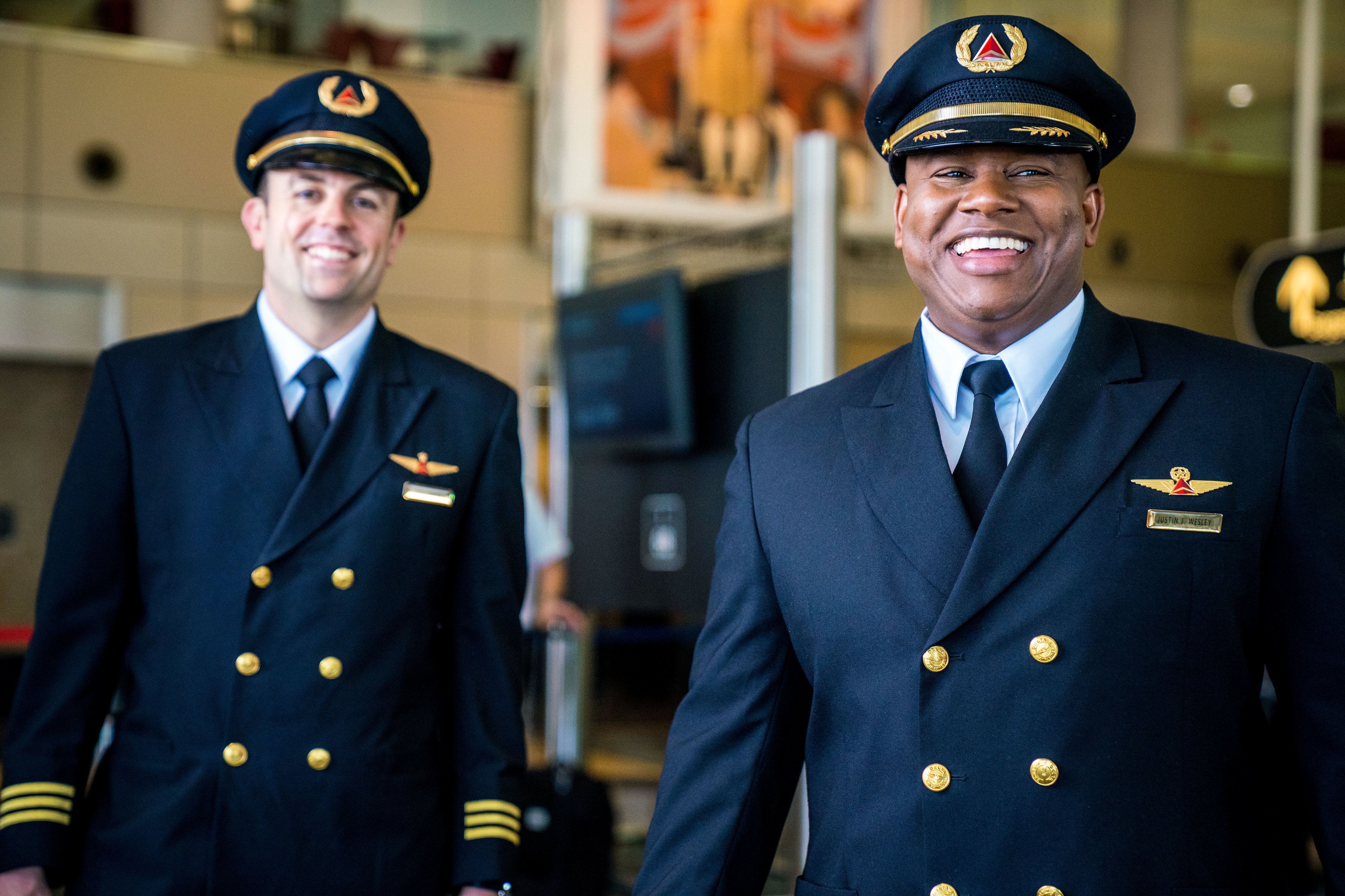 Delta Air Lines pilots in full uniform.
