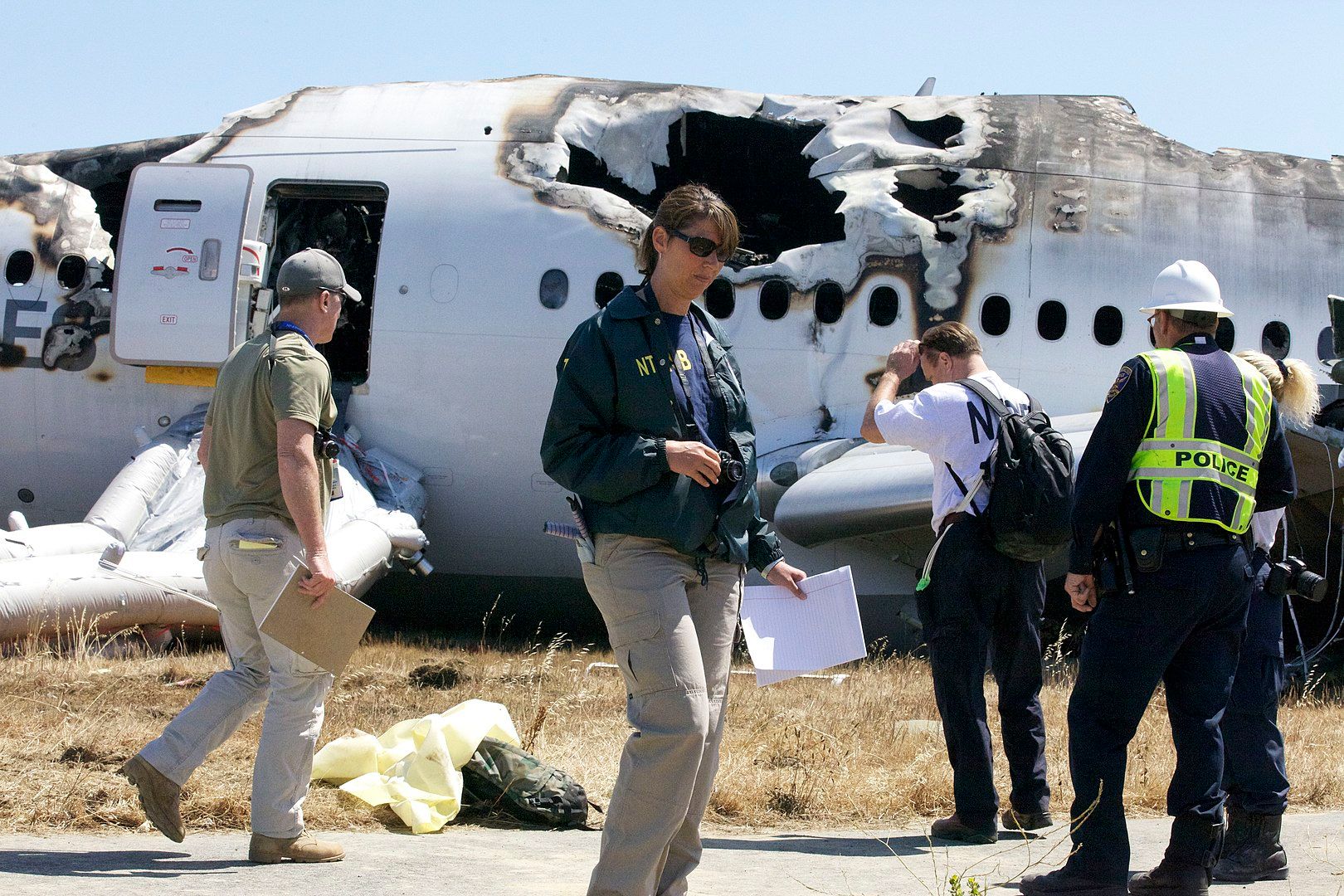 NTSB Investigators at the scene of the Asiana Airlines Flight 214 incident.
