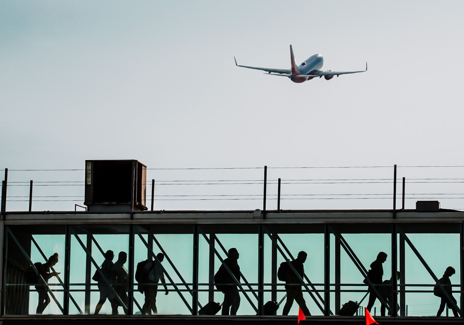 ONT DEP-2 - Jet departing over Ontario International Airport jetbridge