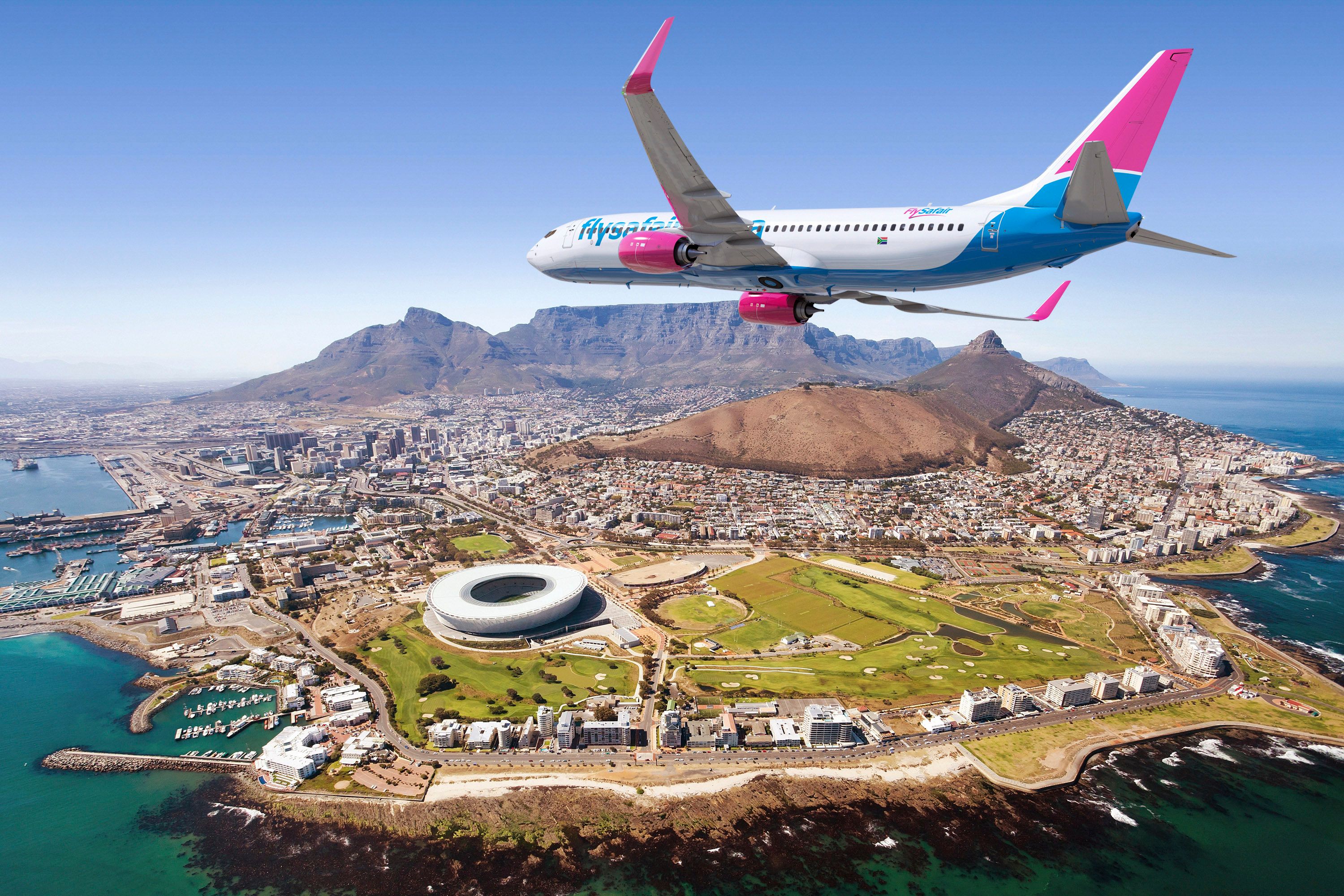A FlySafair Aircraft flying over Cape Town.