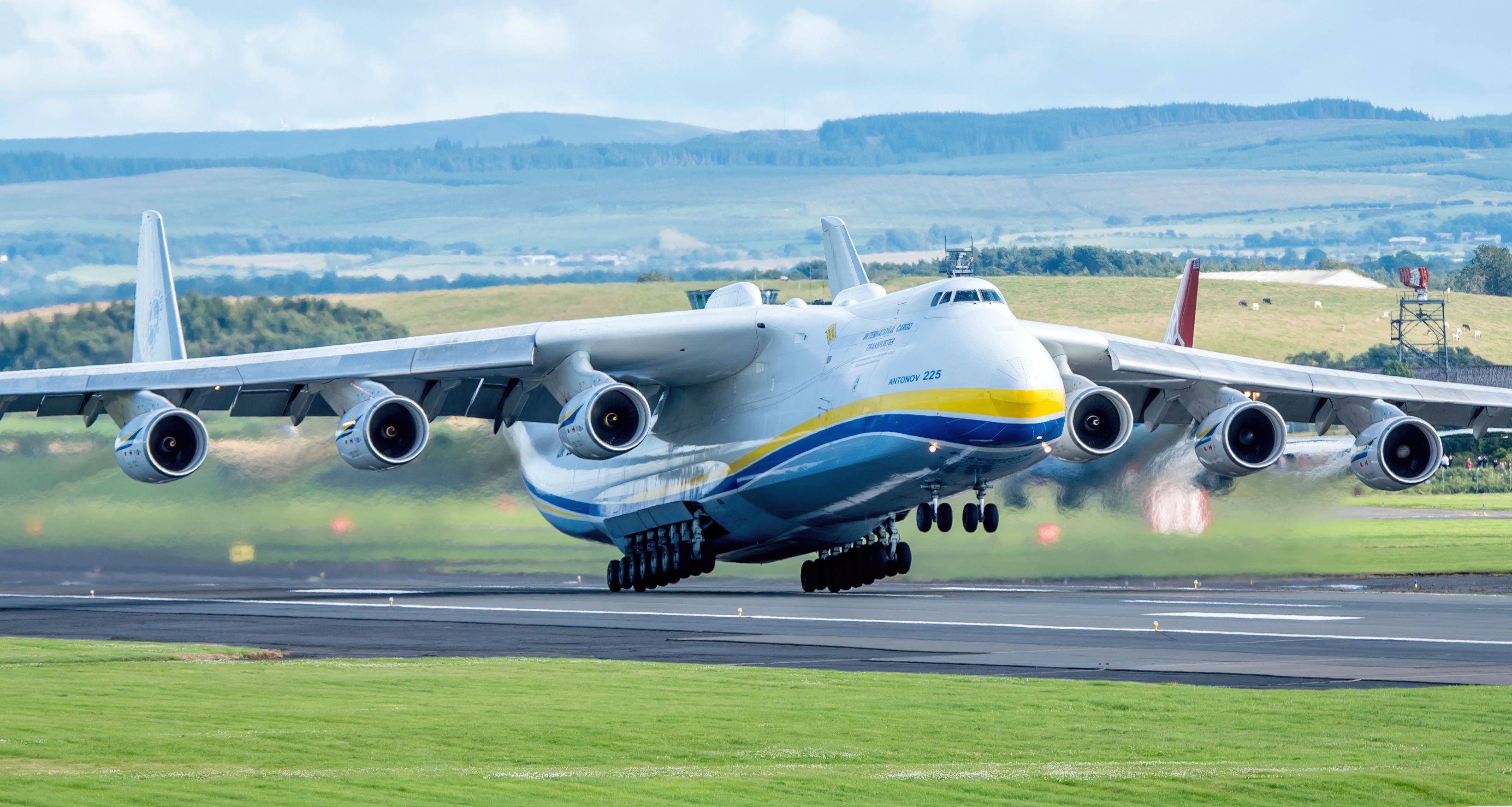The Antonov An-225, taking off from a runway.