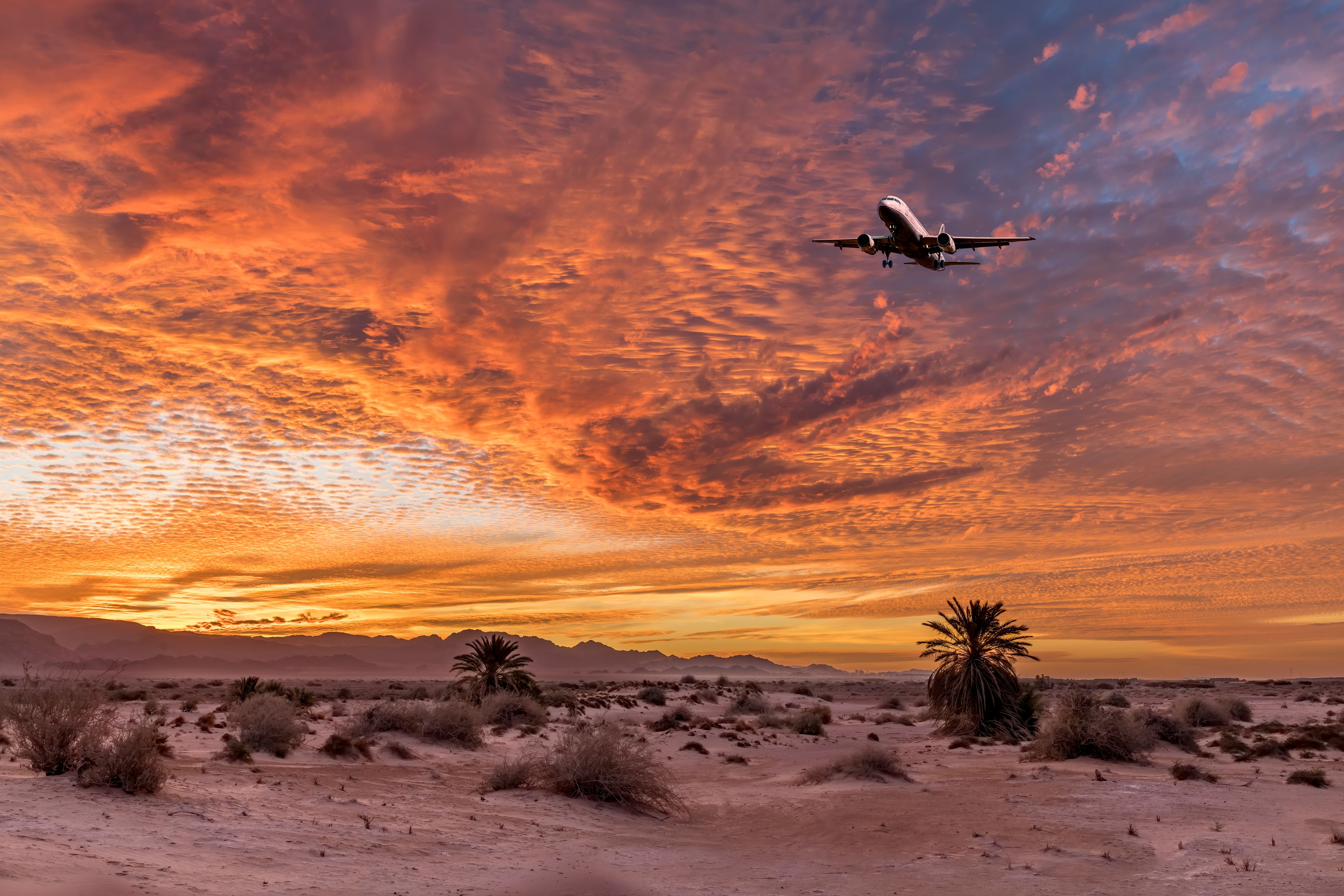 airplane over desert