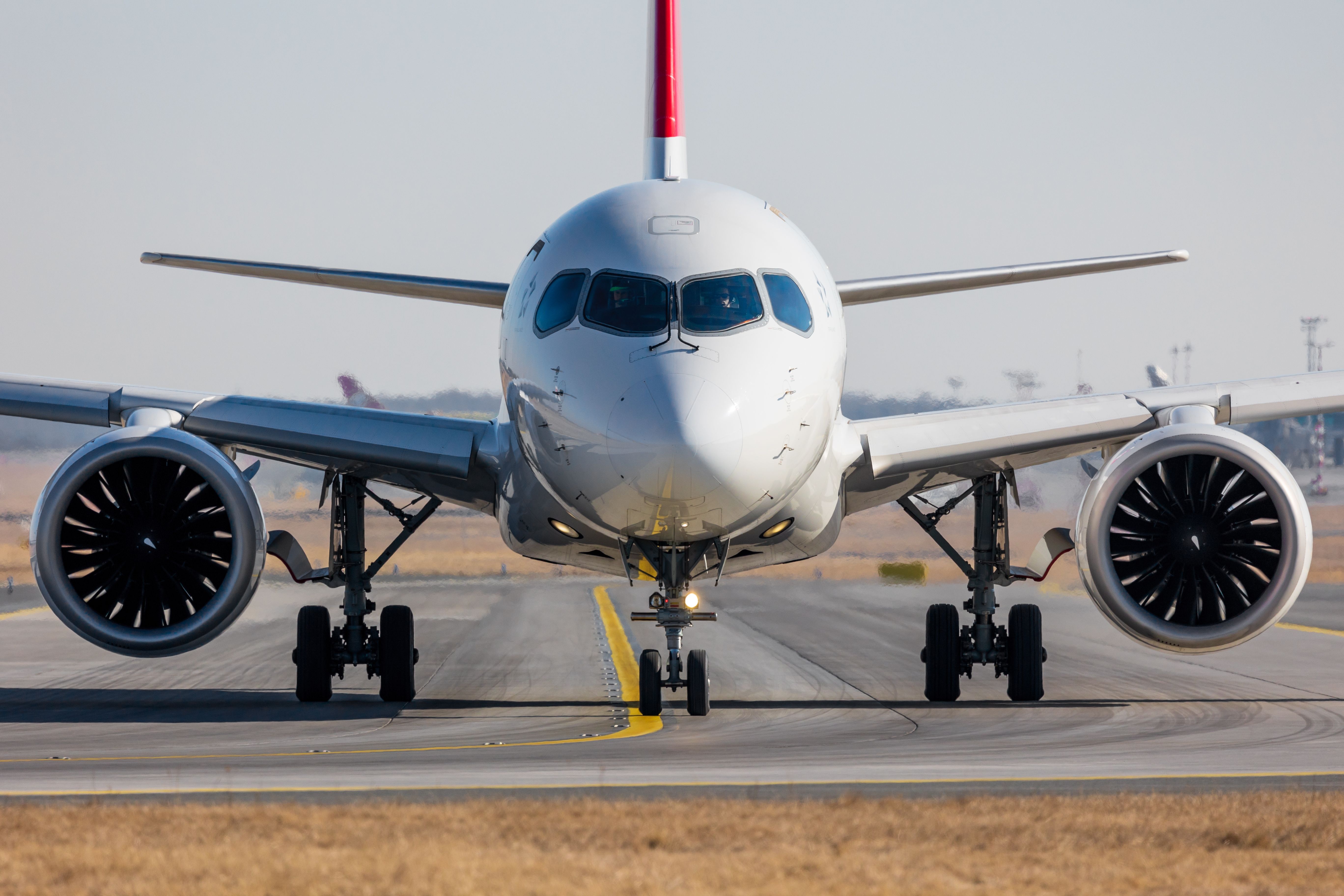 A head-on view of an Airbus A220.