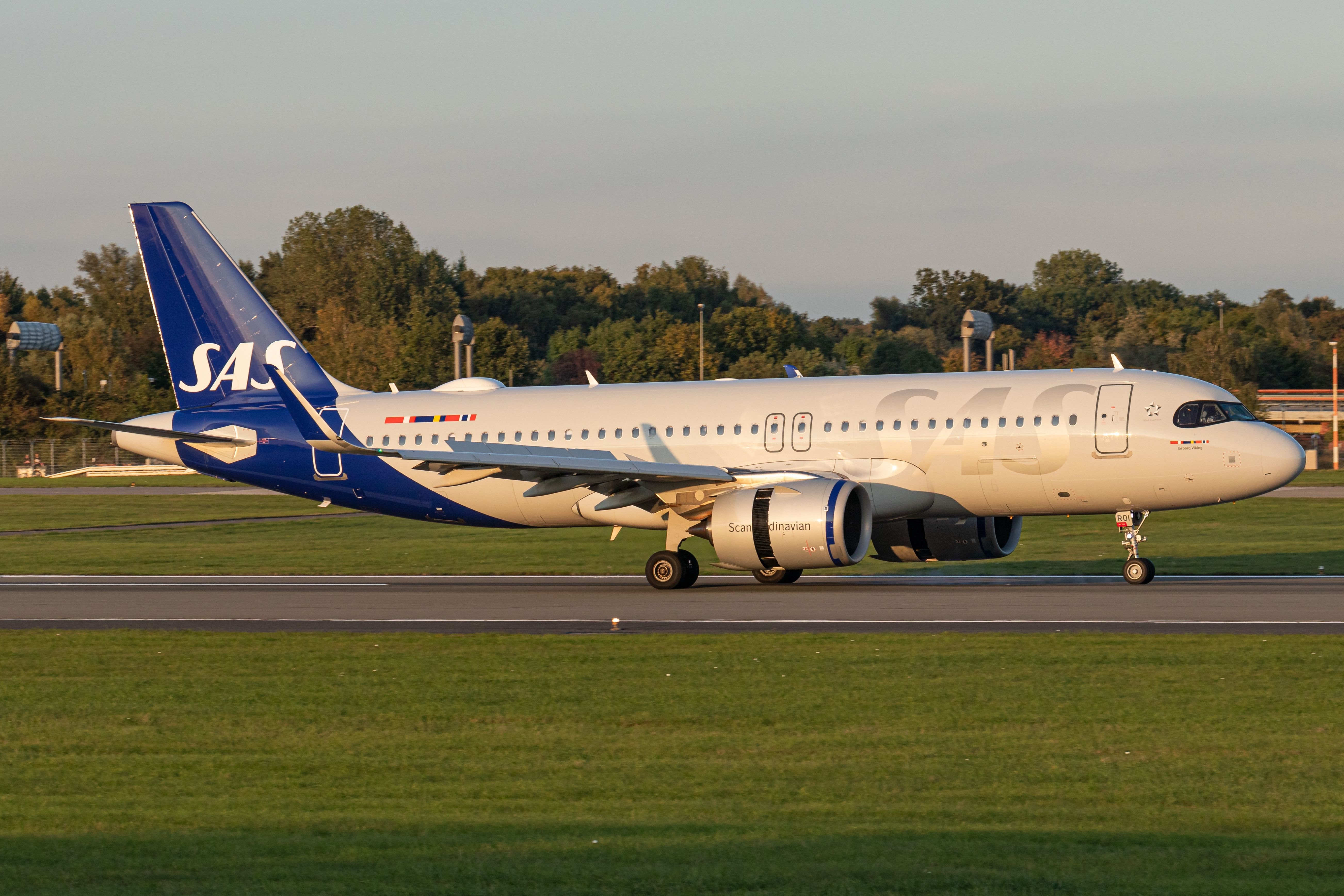 An SAS Airbus A320neo on the runway.