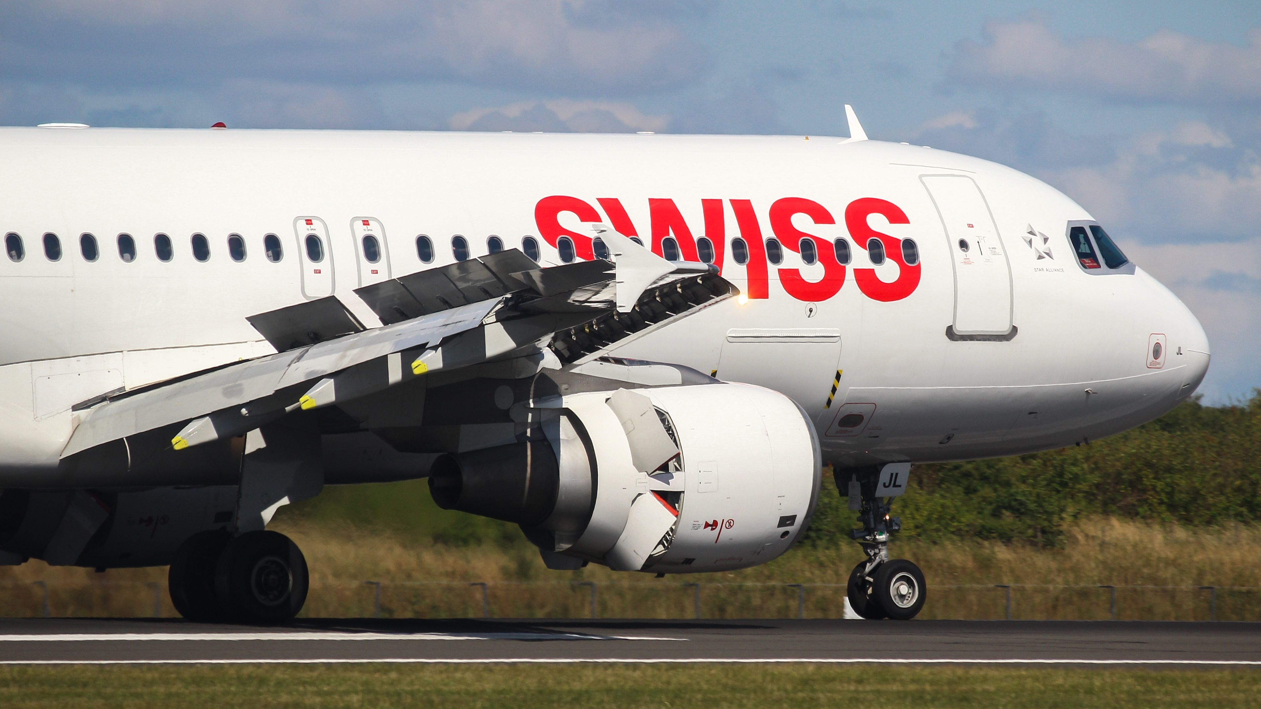 A Swiss Airlines Airbus A320, registration HB-IJL, on the taxiway.