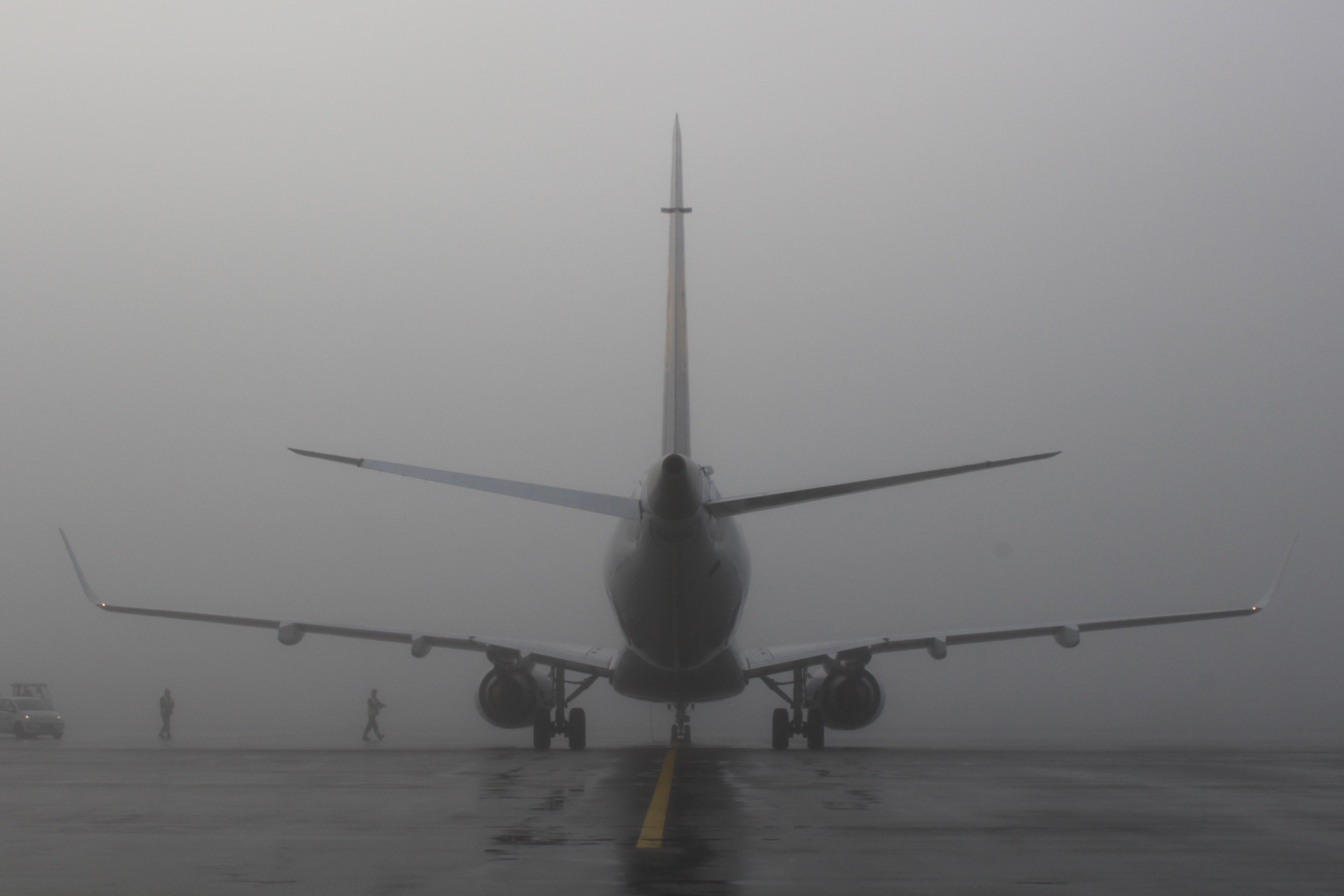 Airplane In Fog