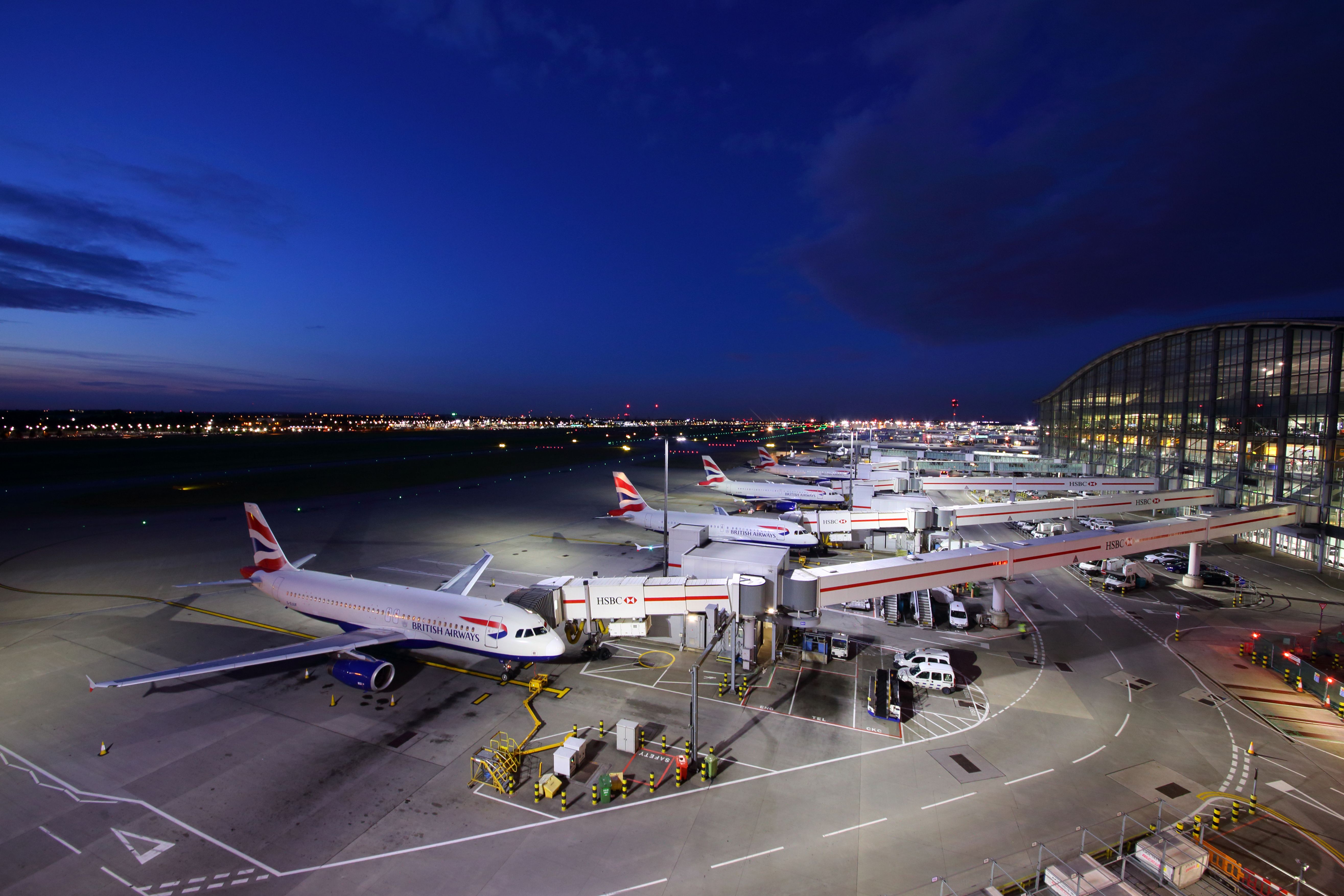 BA aircraft at jet bridges at London Heathrow 