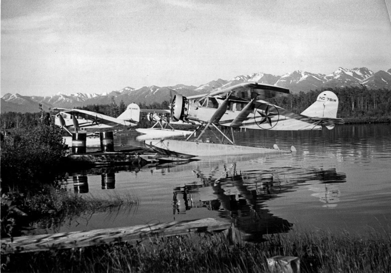 Multiple Star Air Services aircraft parked in water in Alaska.
