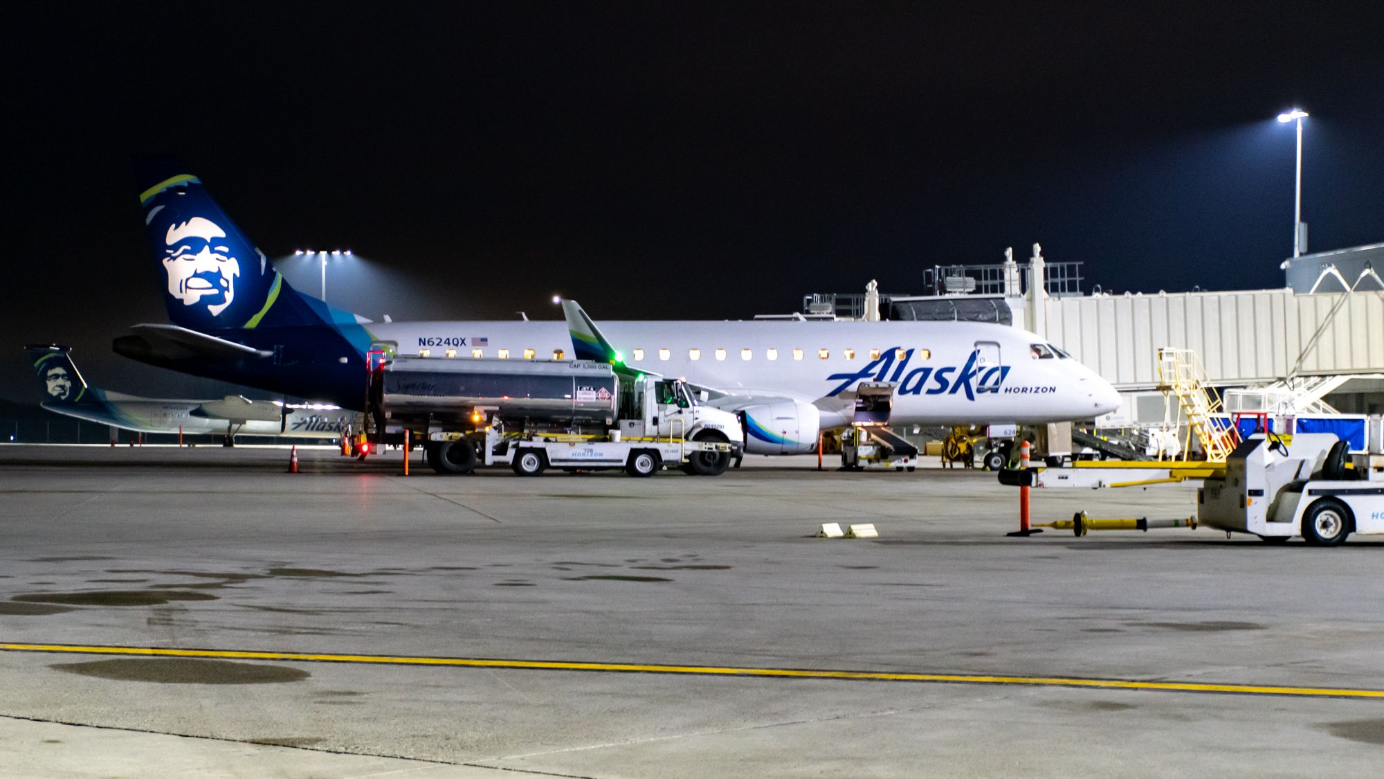 An Alaska Airlines E175 being fueled up at Spokane International Airport.