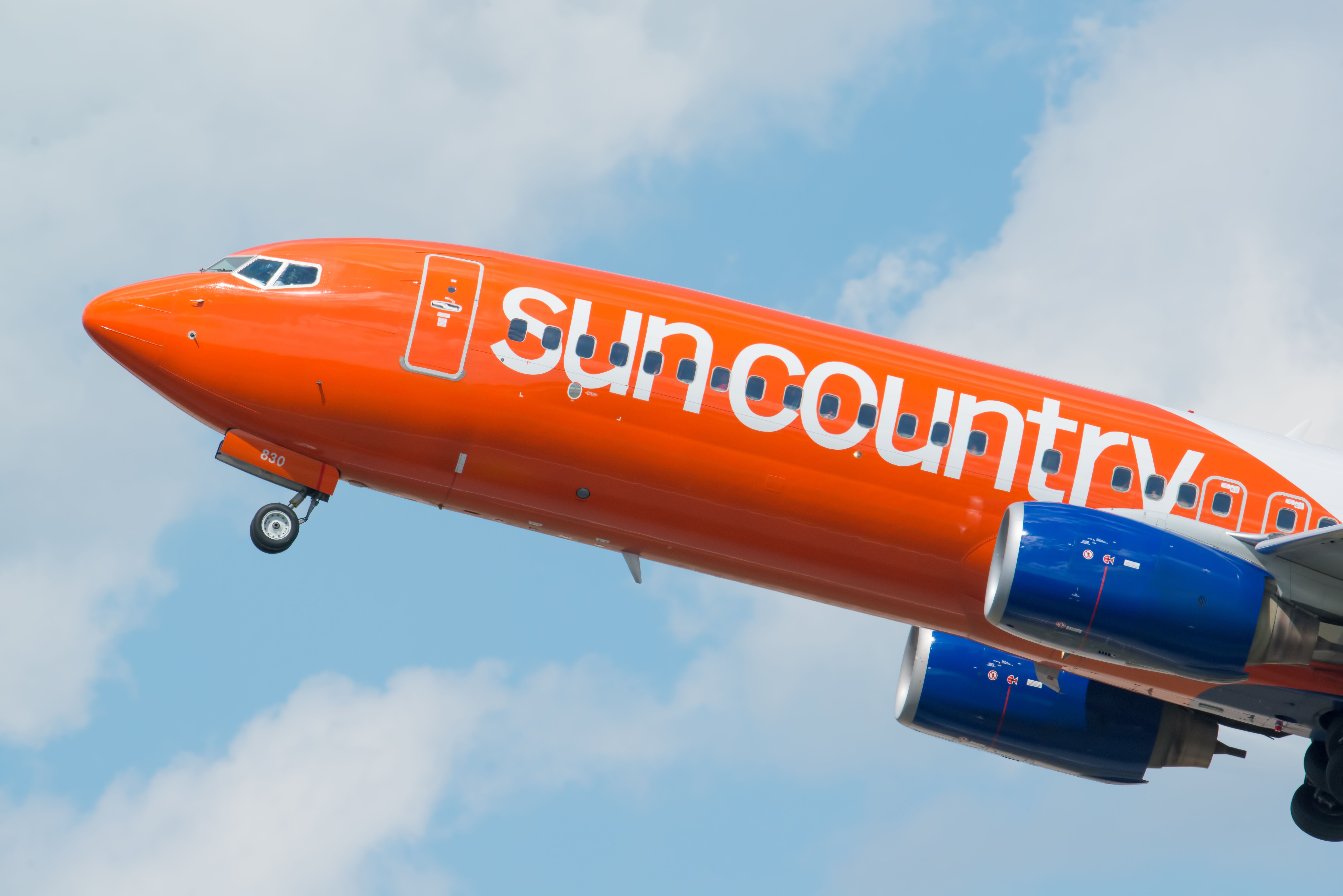 A Sun Country Airlines aircraft flying 