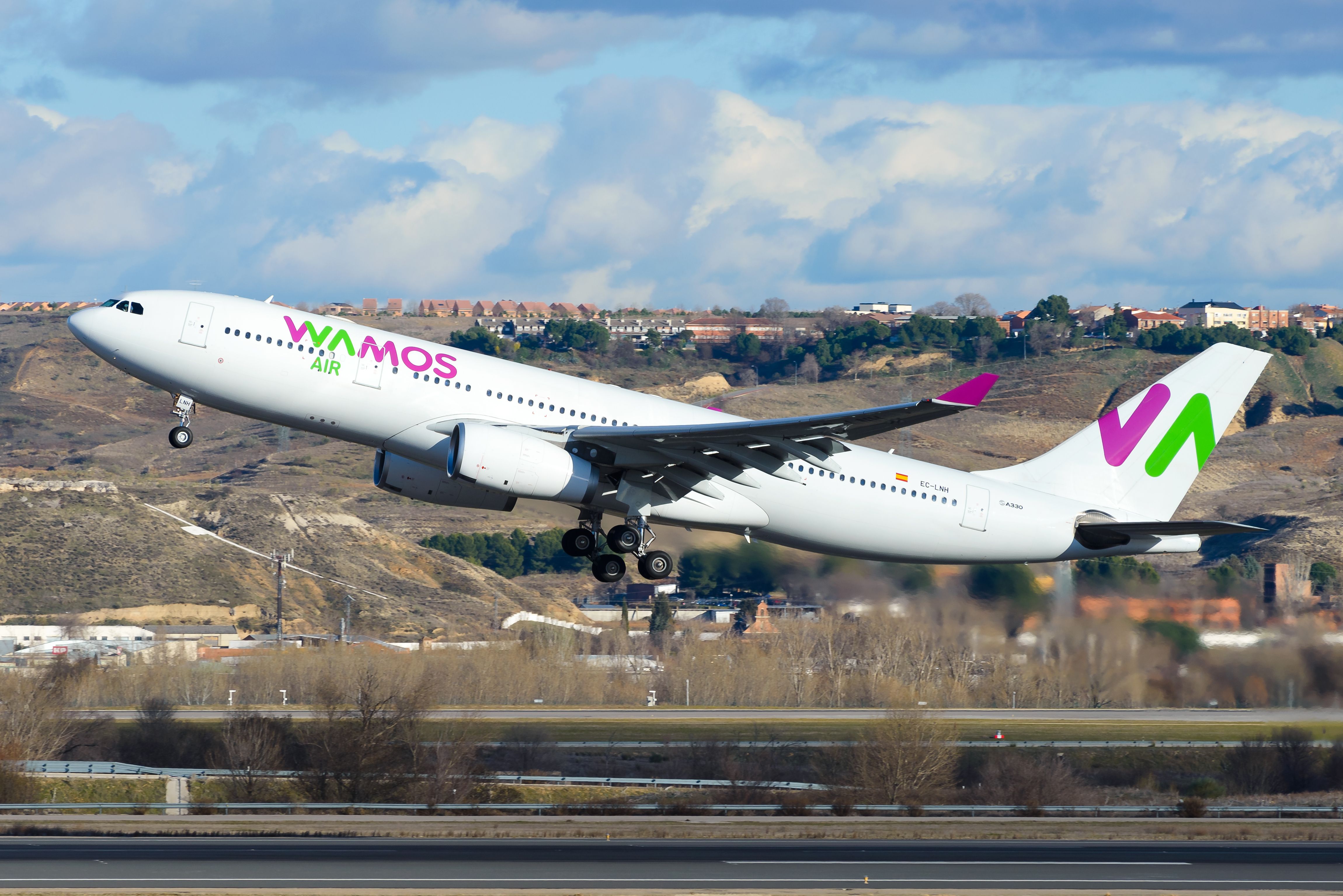 A Wamos Air Airbus A330-200 departing from Madrid 