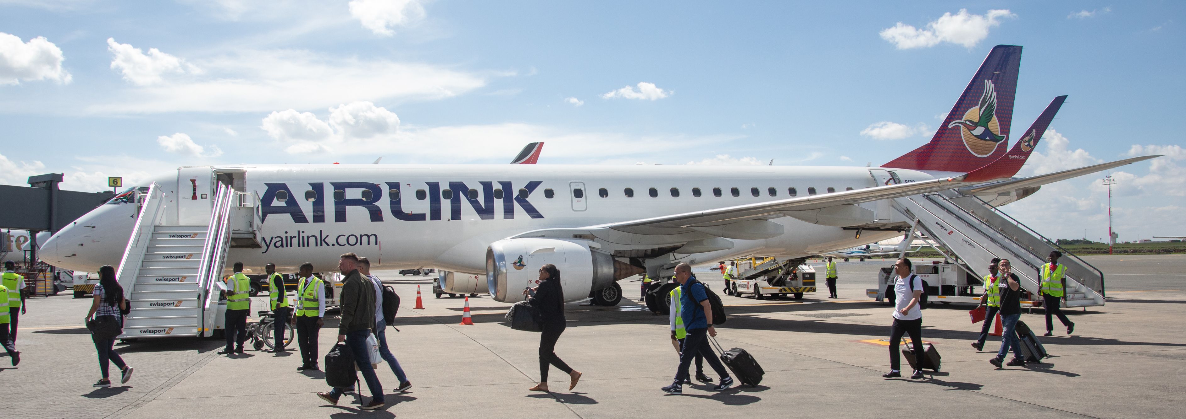 Airlink passengers disembarking at Nairobi Airport