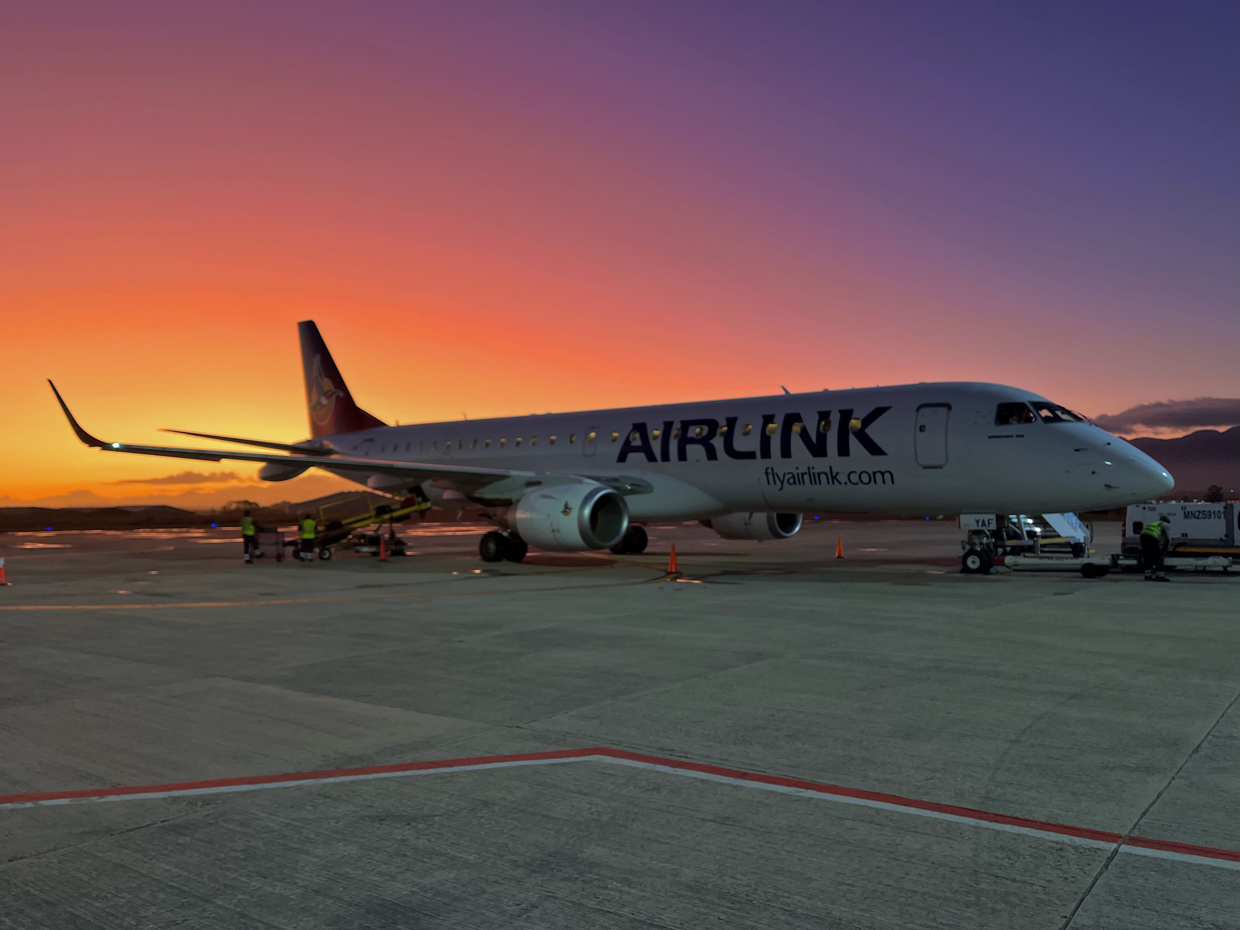 Airlink's Embraer E190 at sunset