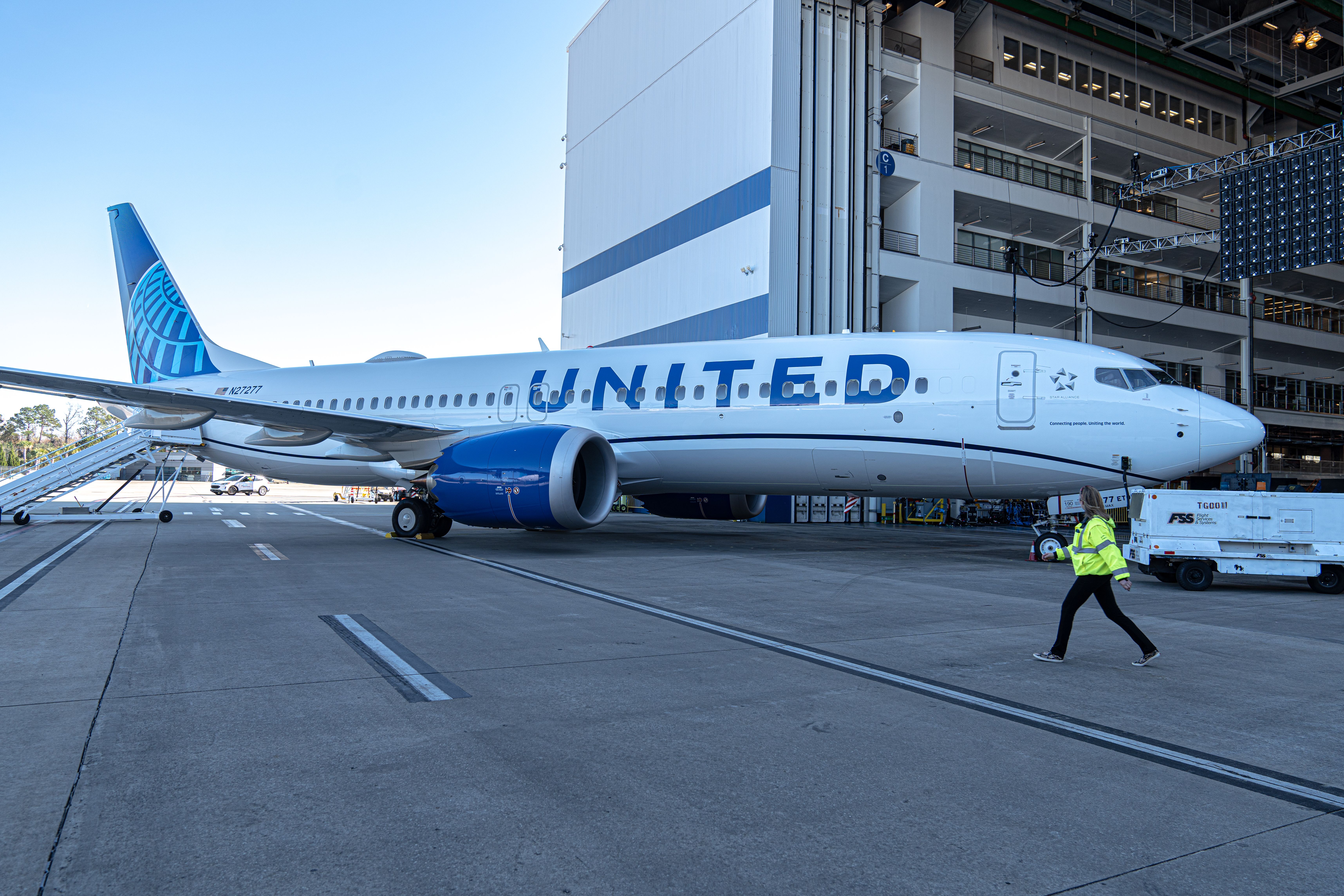 United Airlines Boeing 737 MAX 8 parked at hangar at Boeing Charleston