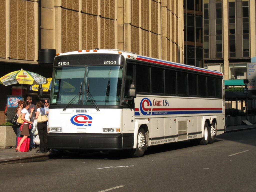 A coach bus parked on the street.