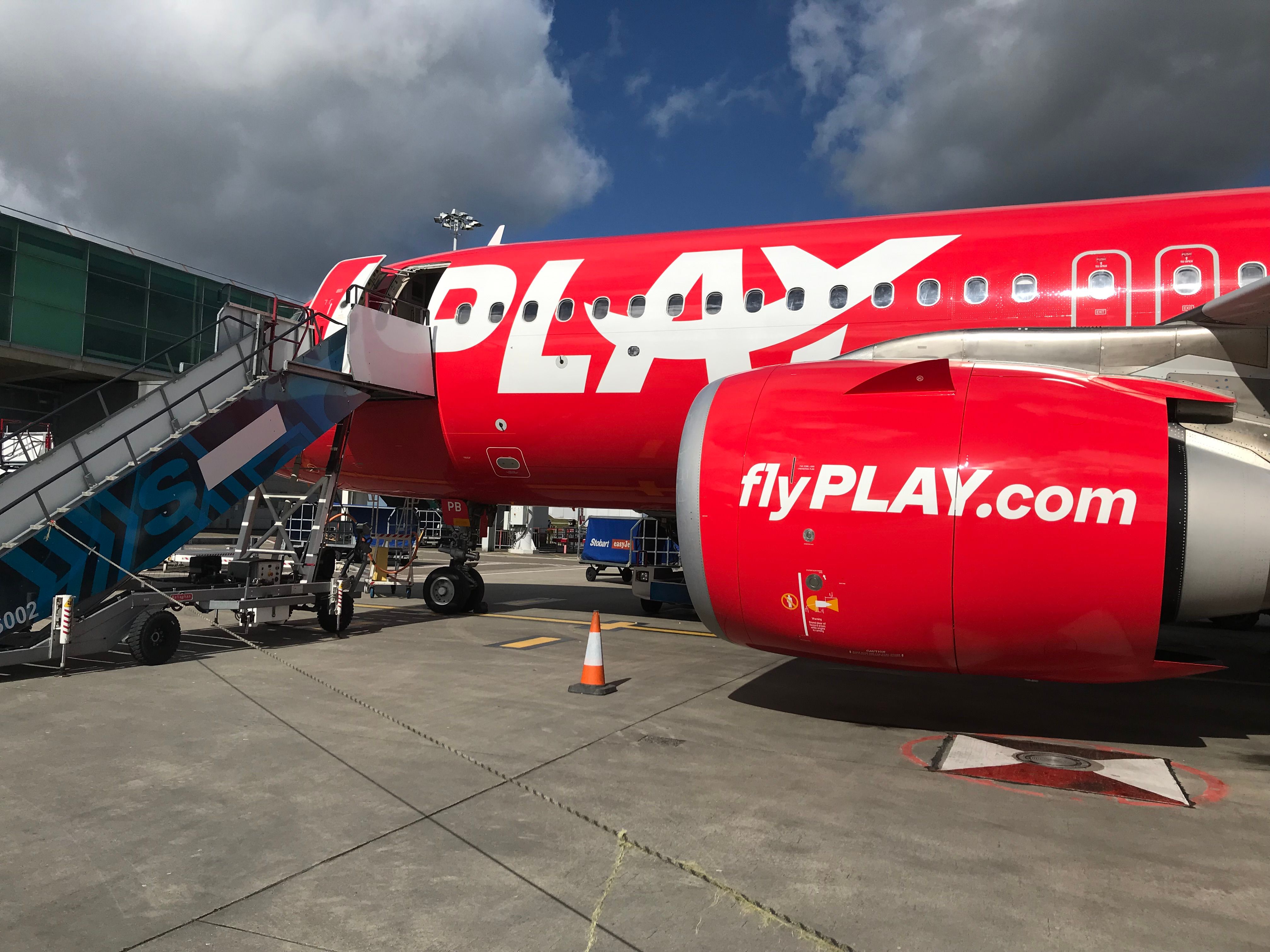 A Play Airbus A320neo, registration TF-PPB, parked at the gate.