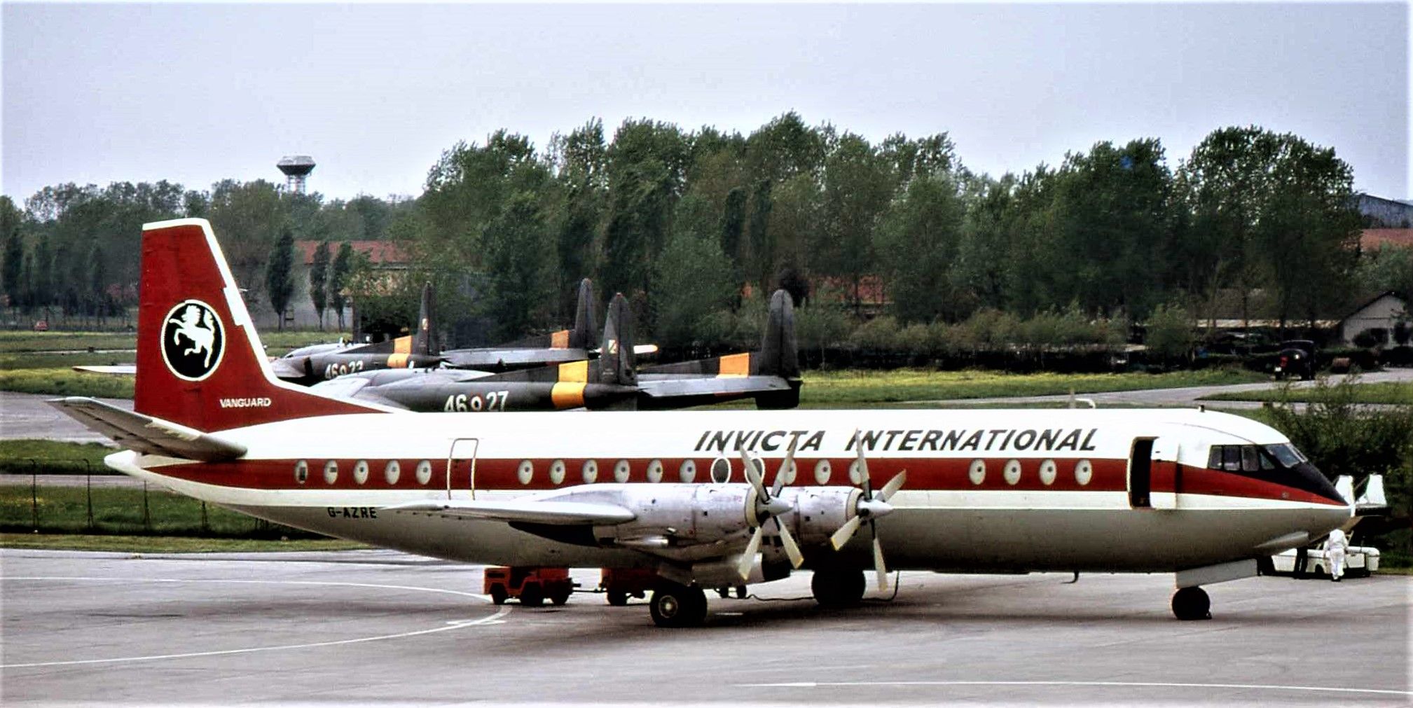 An Invicta International Vanguard , registration G-AZRE, parked at an airfield.