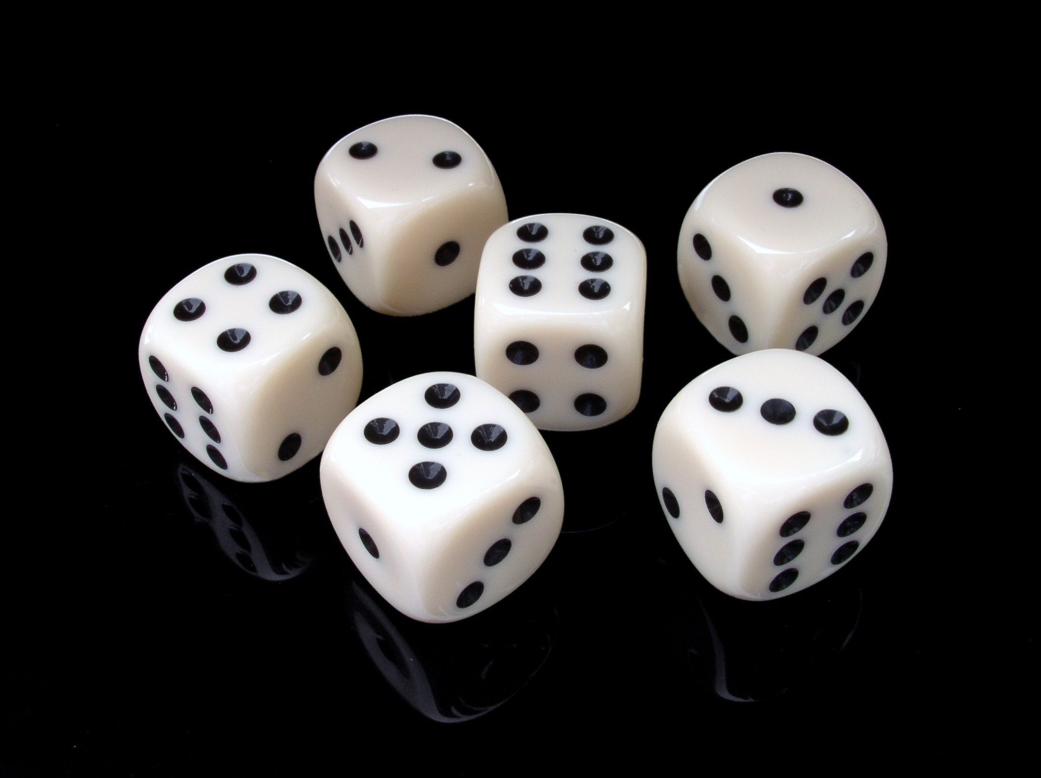 Six dice on a table.