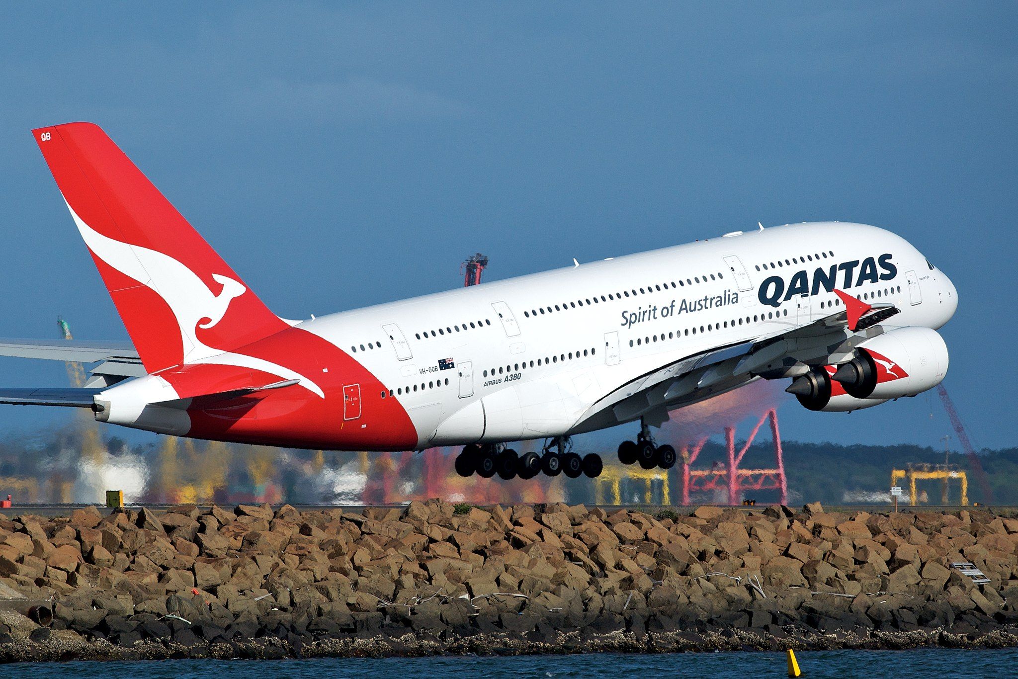 A Qantas A380, registration VH-OQB taking off from Sydney airport.